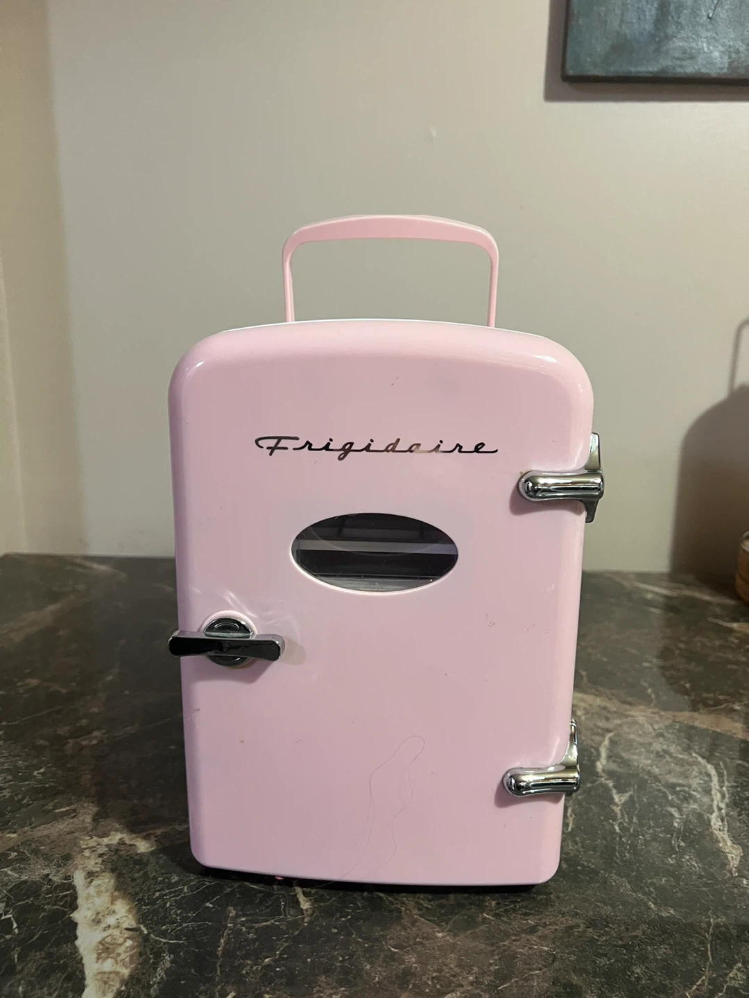 Neverita pequeña de medio uso.