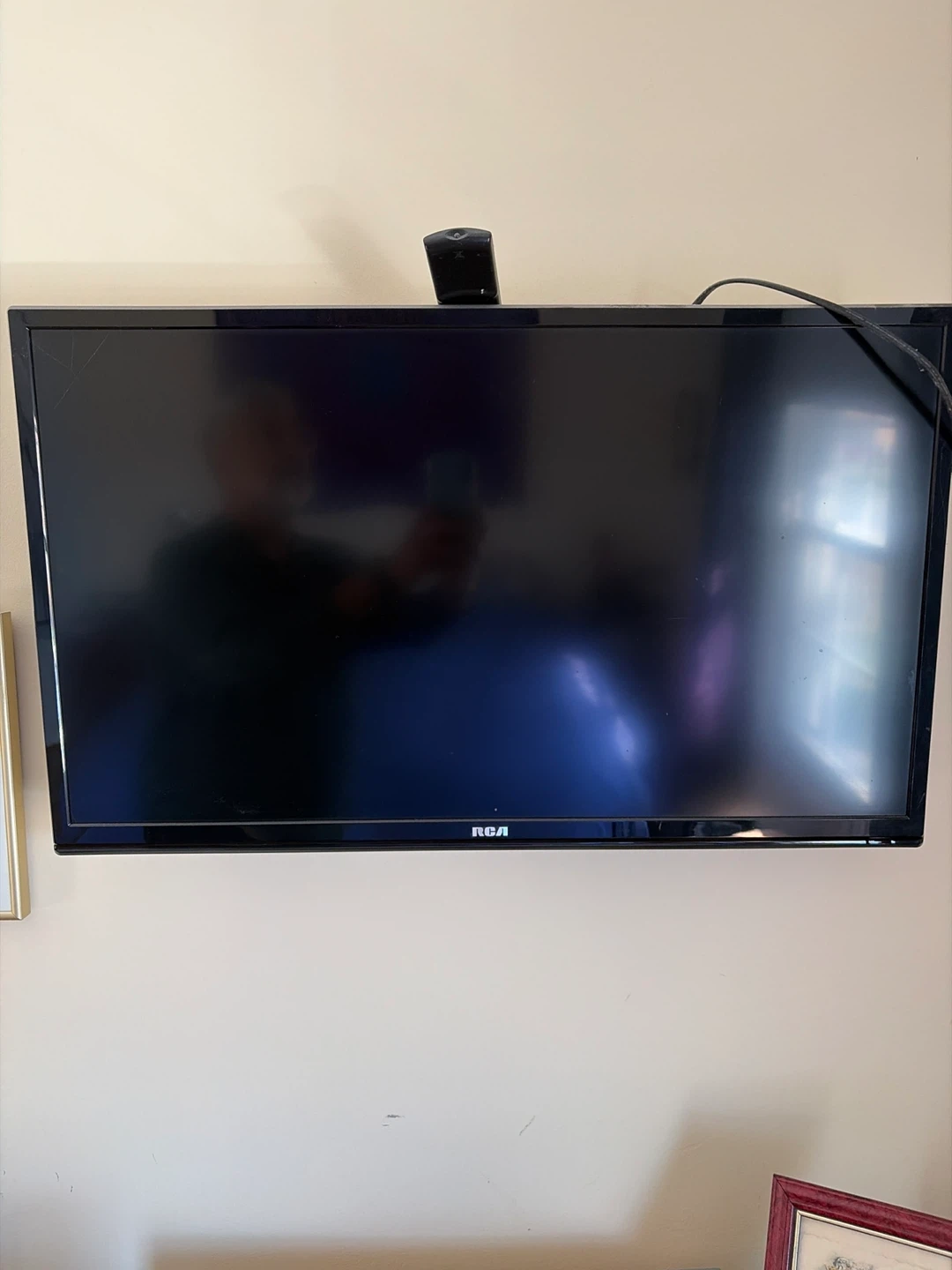 RCA 32-inch LED TV with wall mount