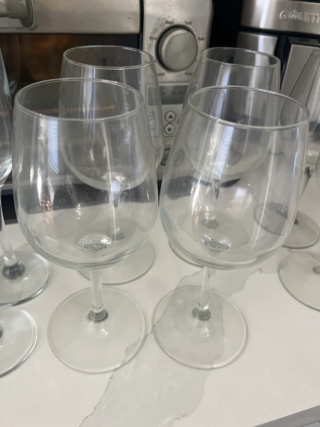 FREE: Set of 7 Clear Glass Wine Glasses