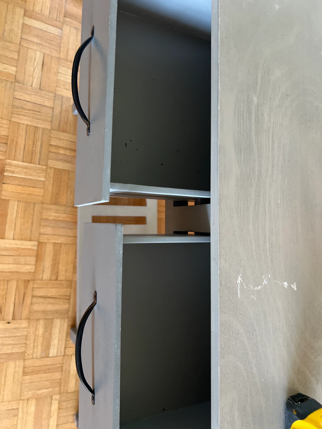 Grey two-drawer console table with shelf