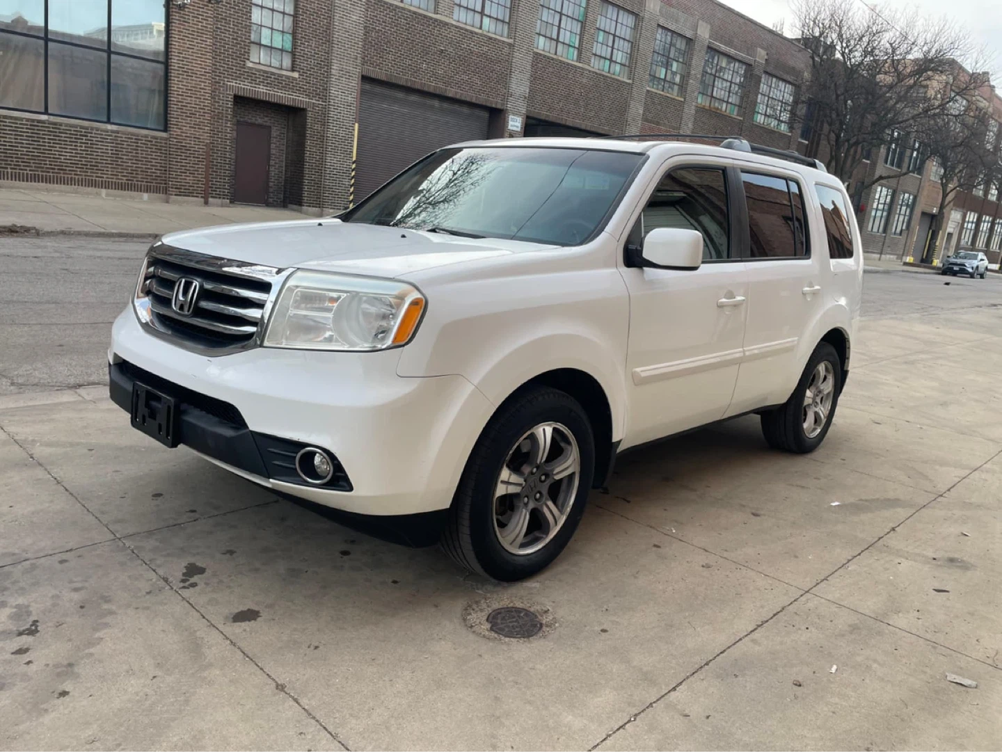 2015 White Honda Pilot SUV con 190 mil millas