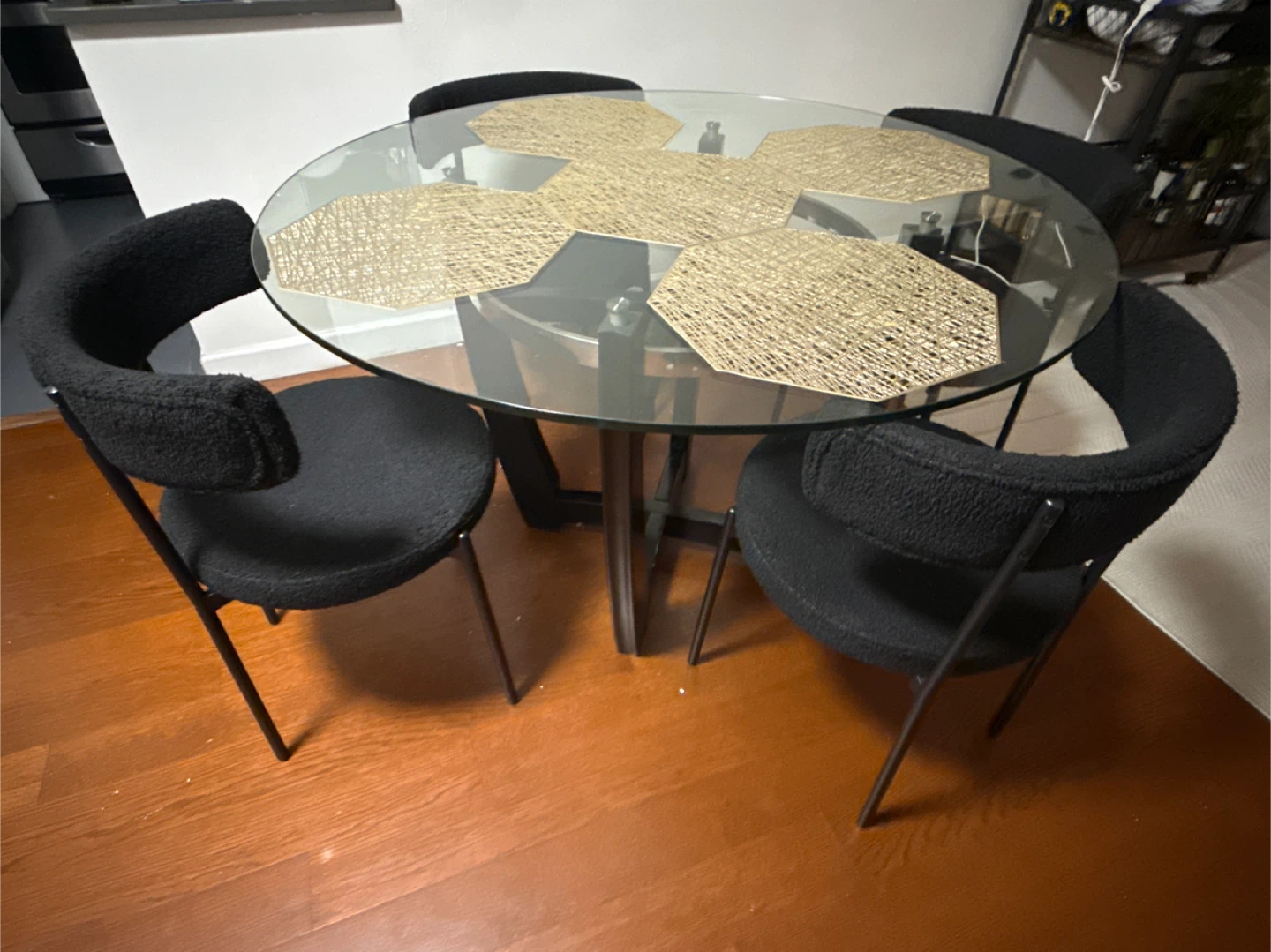 Glass Top Dining Table with 4 Black Upholstered Chairs