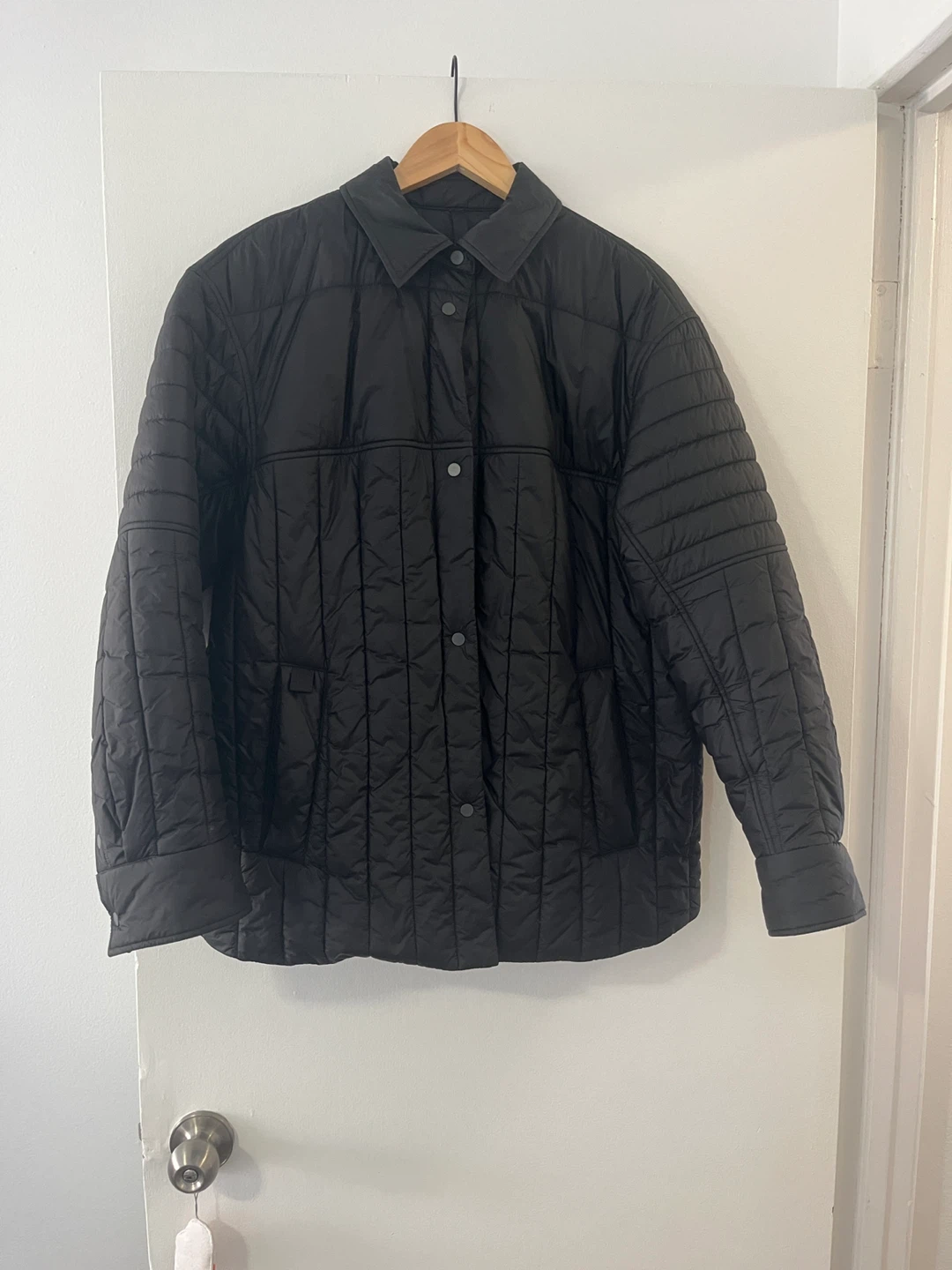 Lululemon Black Quilted Jacket with 'CAN' Logo