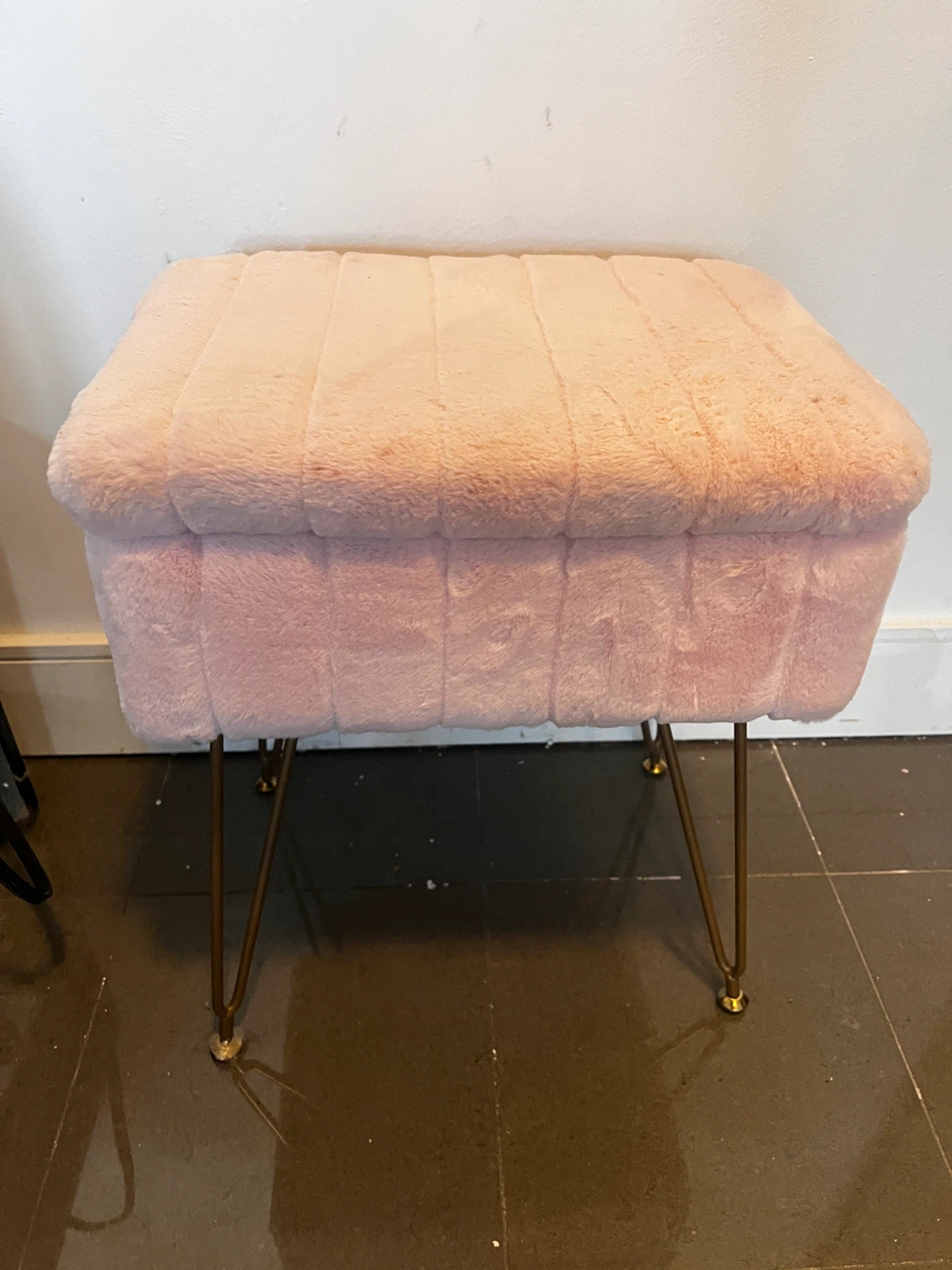 Pink fuzzy ottoman