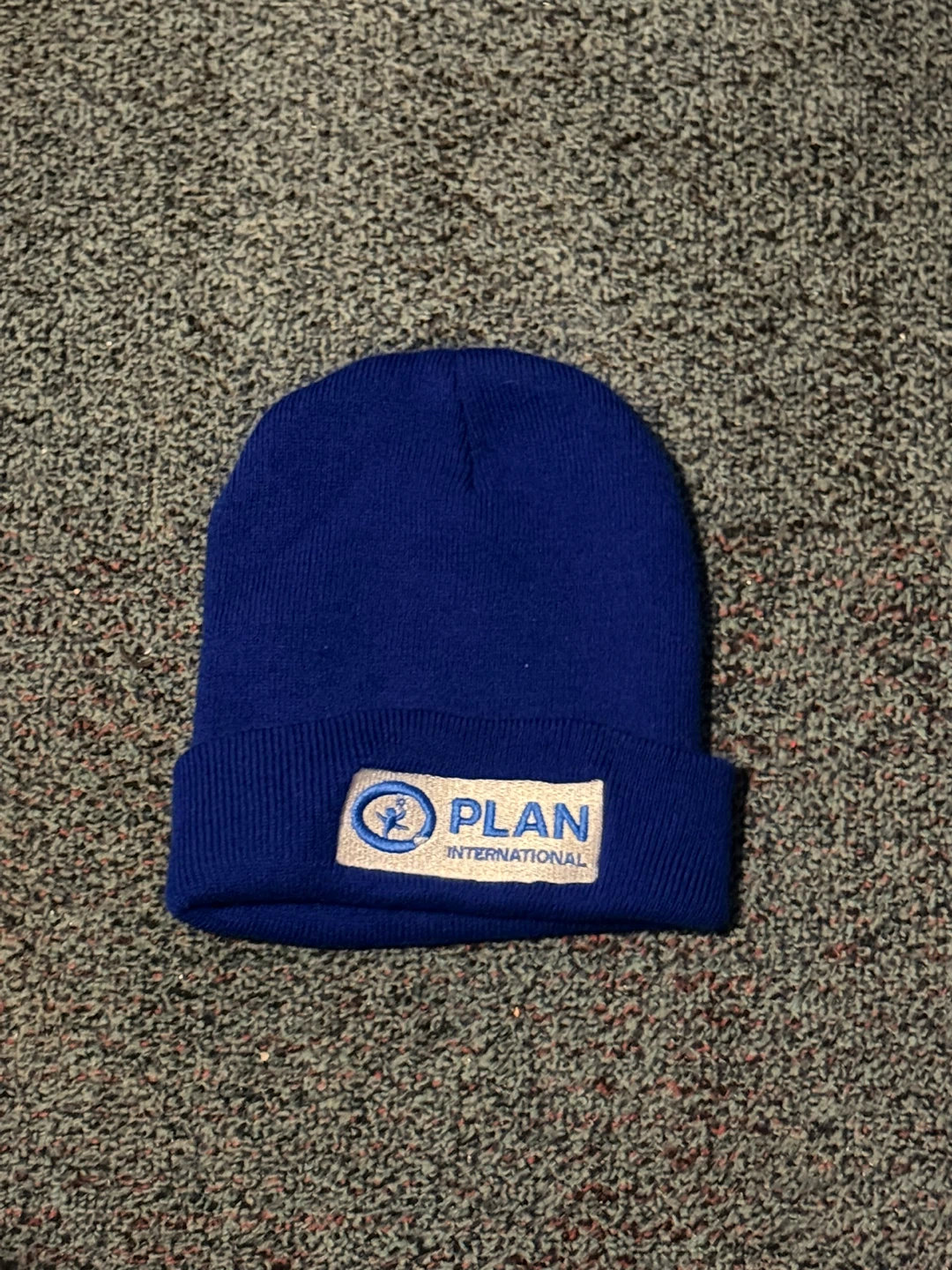 Blue beanie with embroidered logo