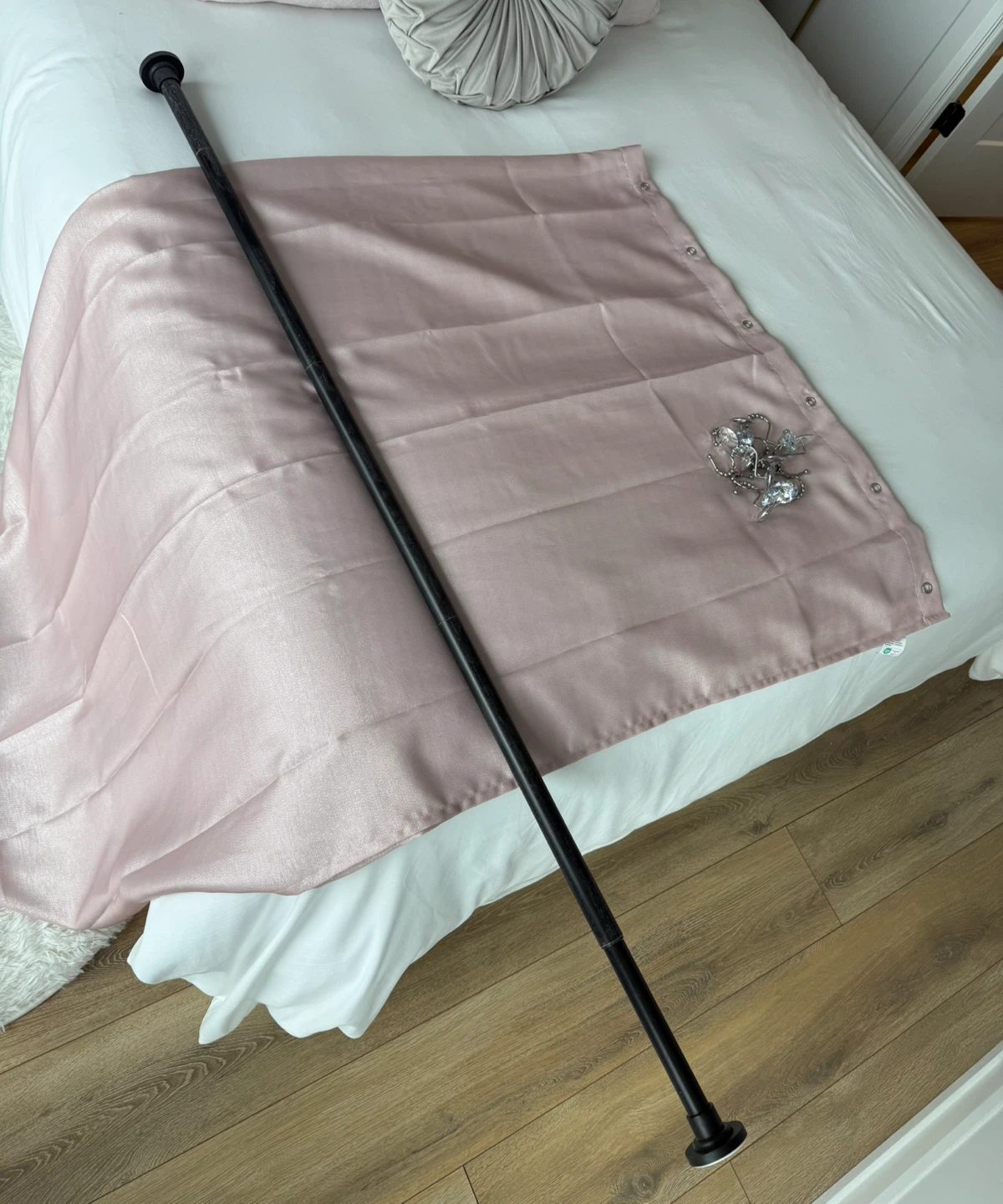 Pink shower curtain, Black shower rod and crystal shower hooks