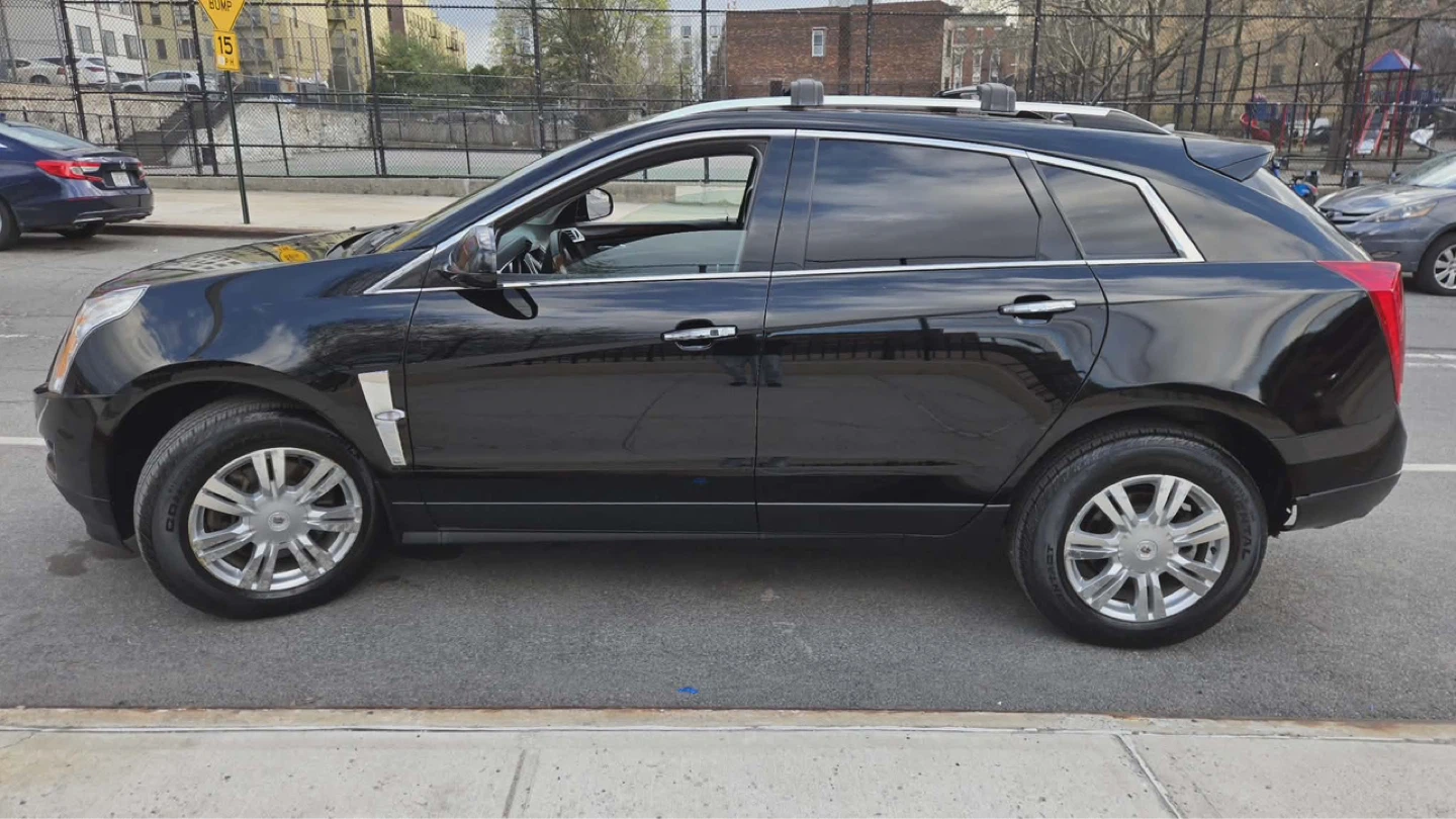 Black Cadillac SRX Luxury SUV - photo 3
