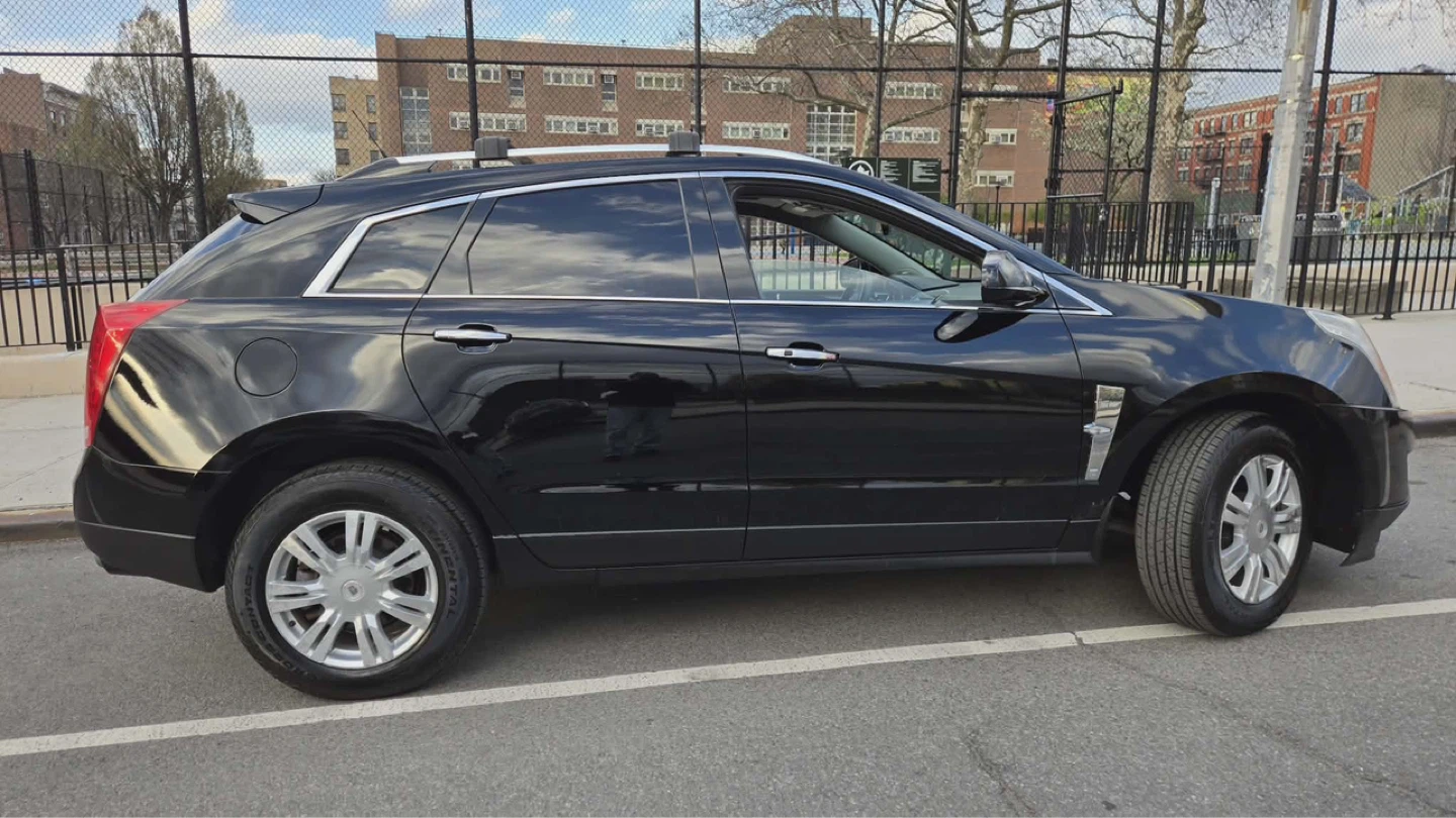 Black Cadillac SRX Luxury SUV - photo 2