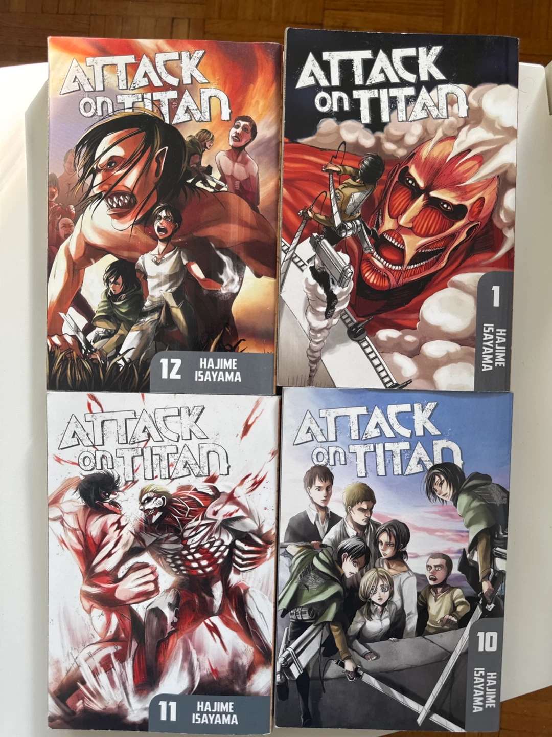 Attack on Titan Manga Volumes 1, 10, 11, 12
