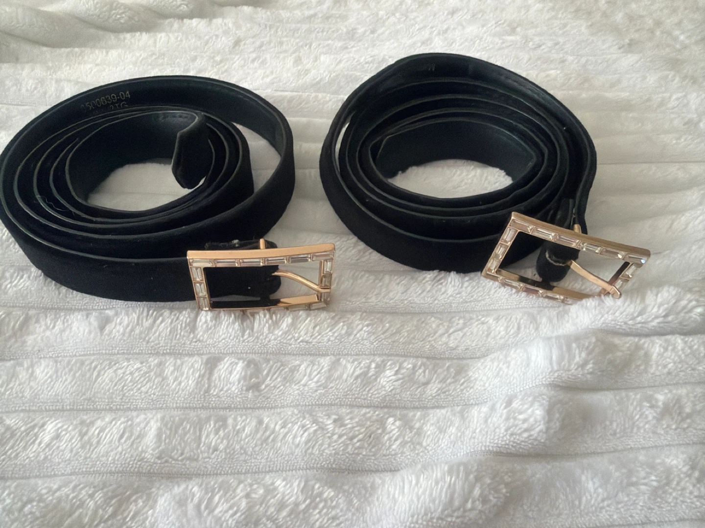 Two Black Belts with Gold Buckles