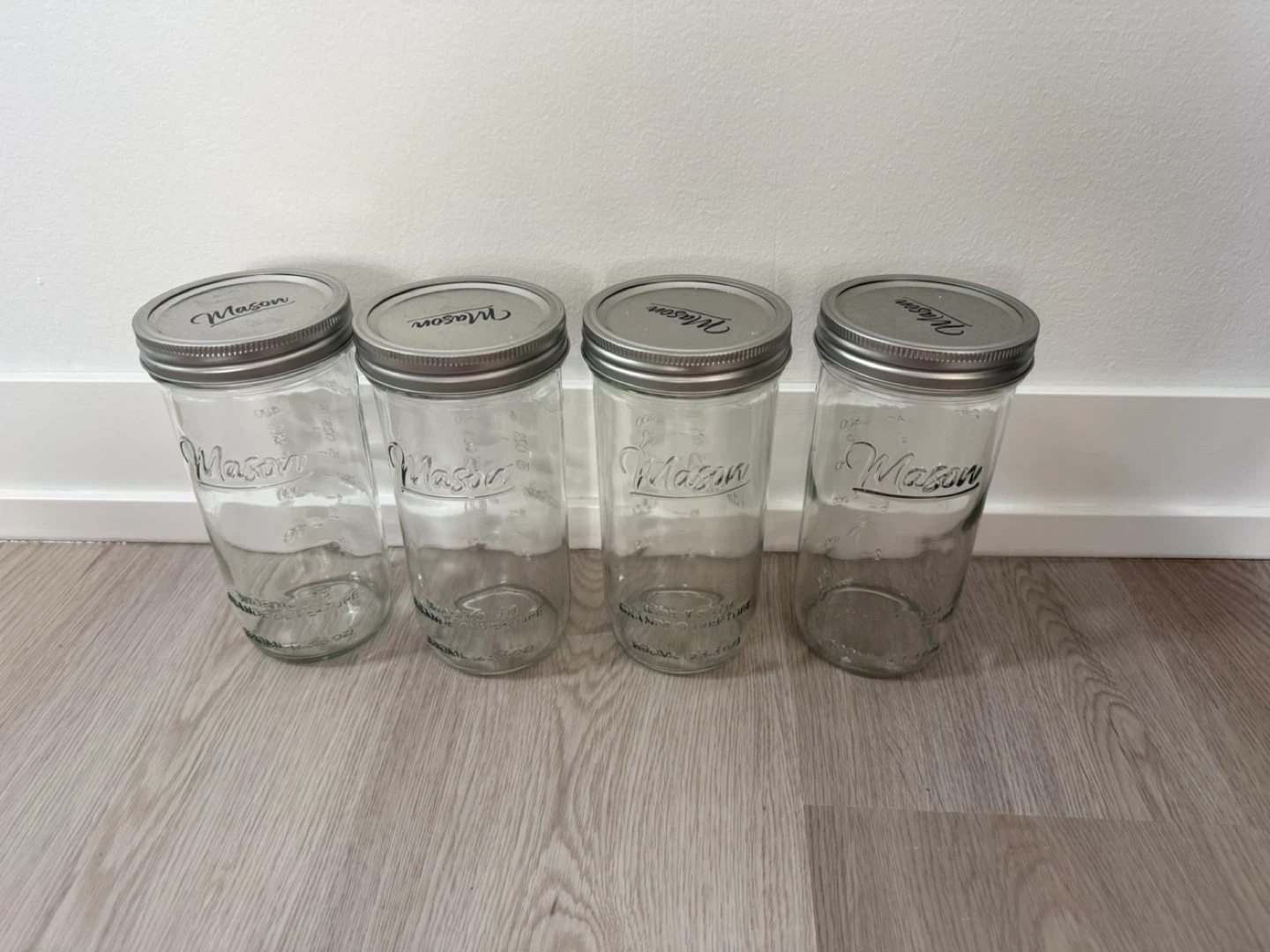 4 tall and thin mason jars with lids - gently used