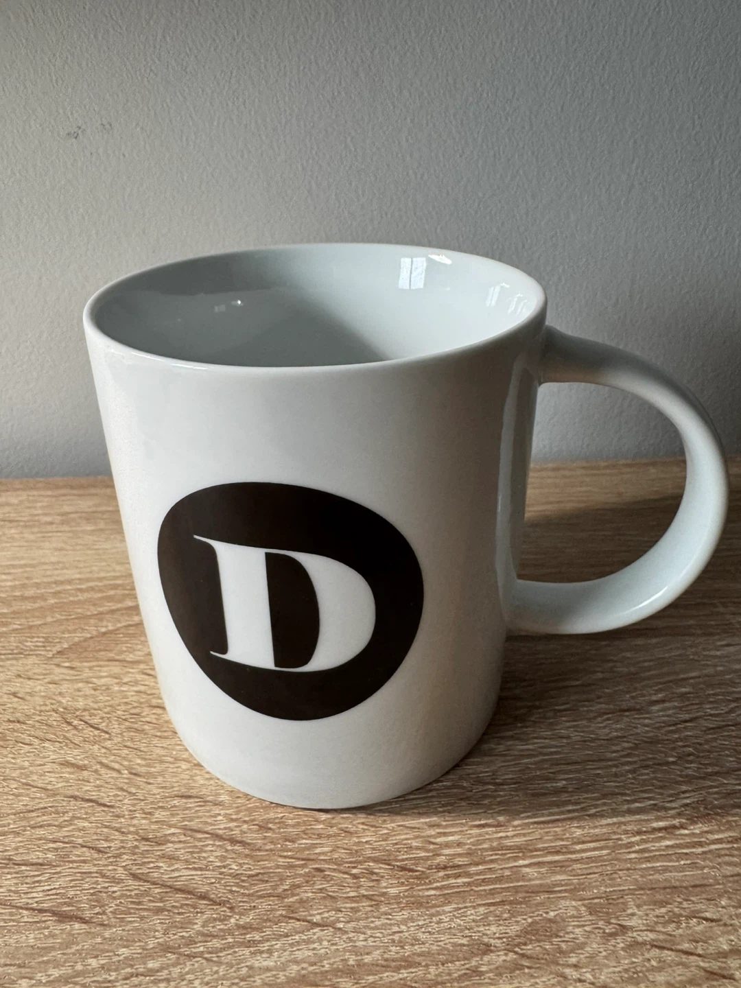 Paper Destiny Mug with 'D' logo