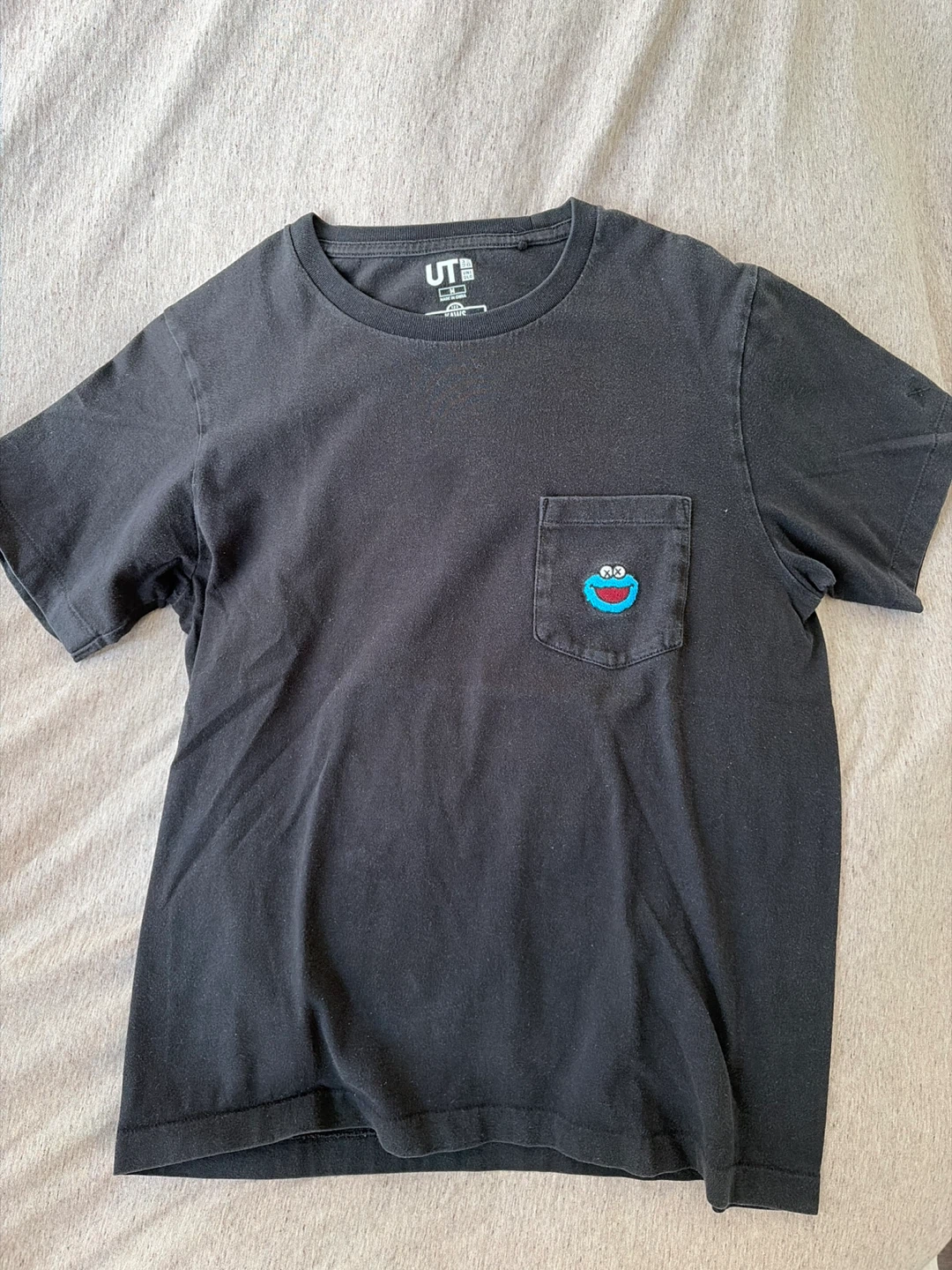 Kaws x Uniqlo UT Sesame Street Cookie Monster Pocket T-Shirt