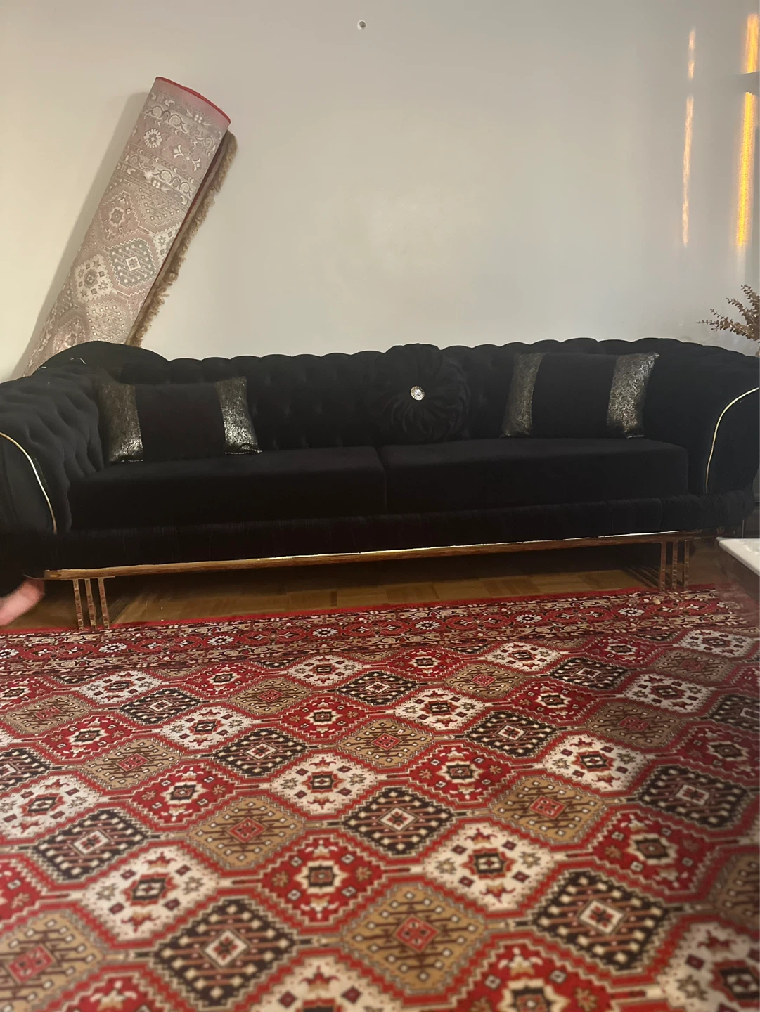 Black Tufted Chesterfield Sofa with Gold Accents for 8 people