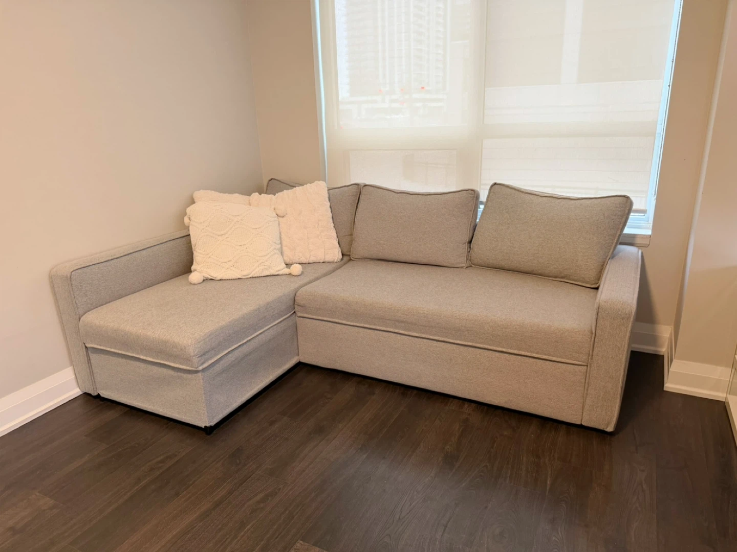 Space-Saving Light-Grey Sectional Sofa Bed with Hidden Storage