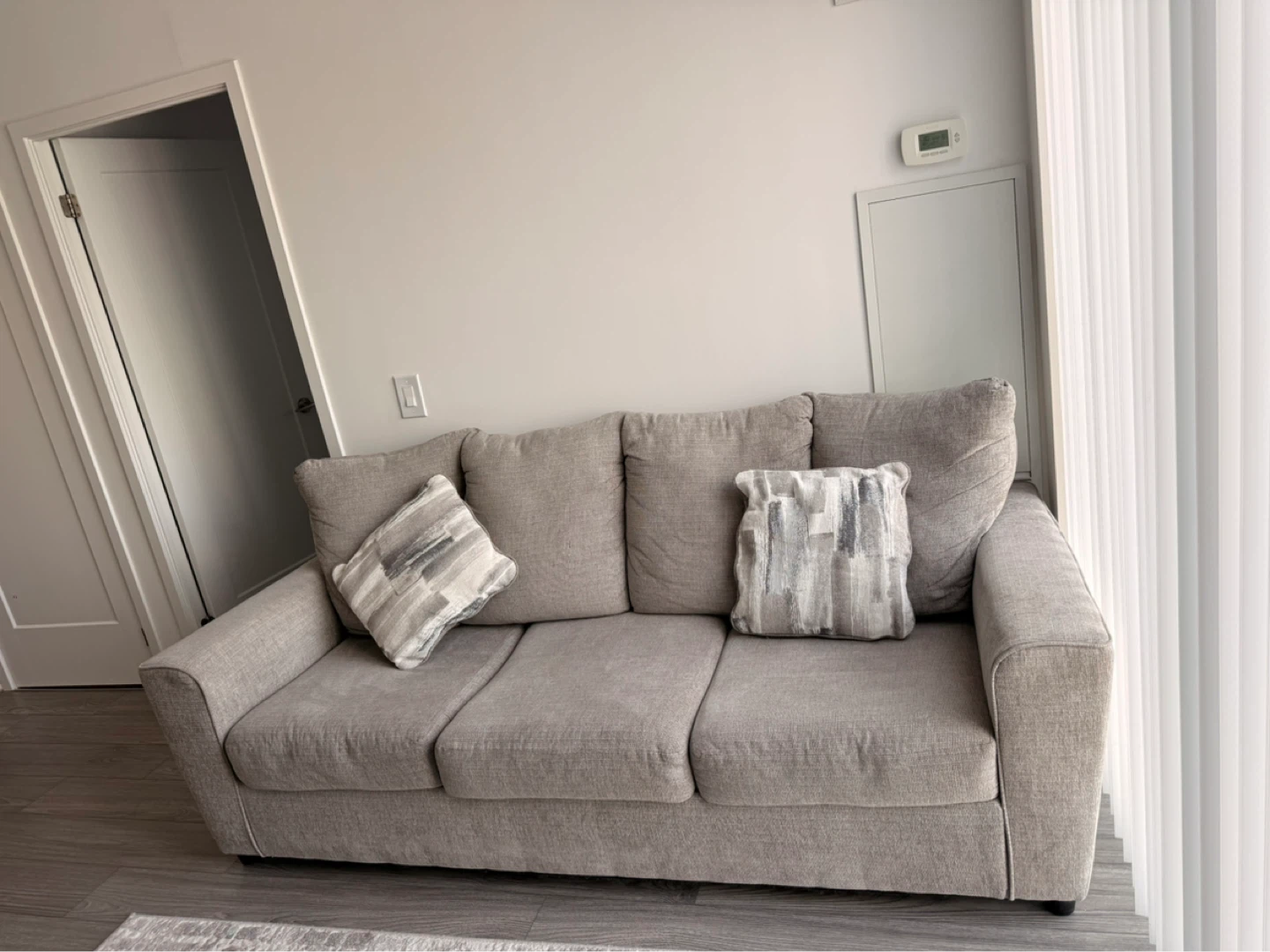 Grey Fabric Sofa with Accent Pillows