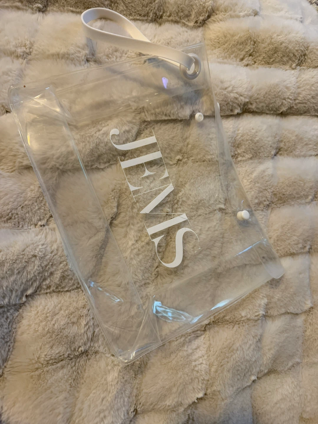 Clear vinyl travel bag with snap closure