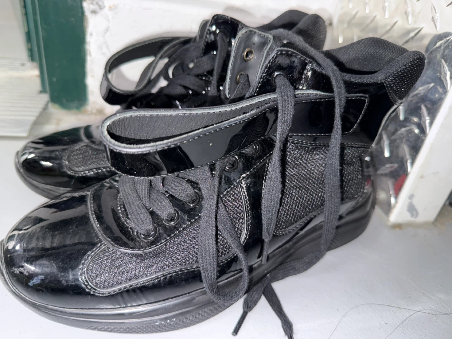 Prada Black Patent Leather & Mesh High-Top Sneakers