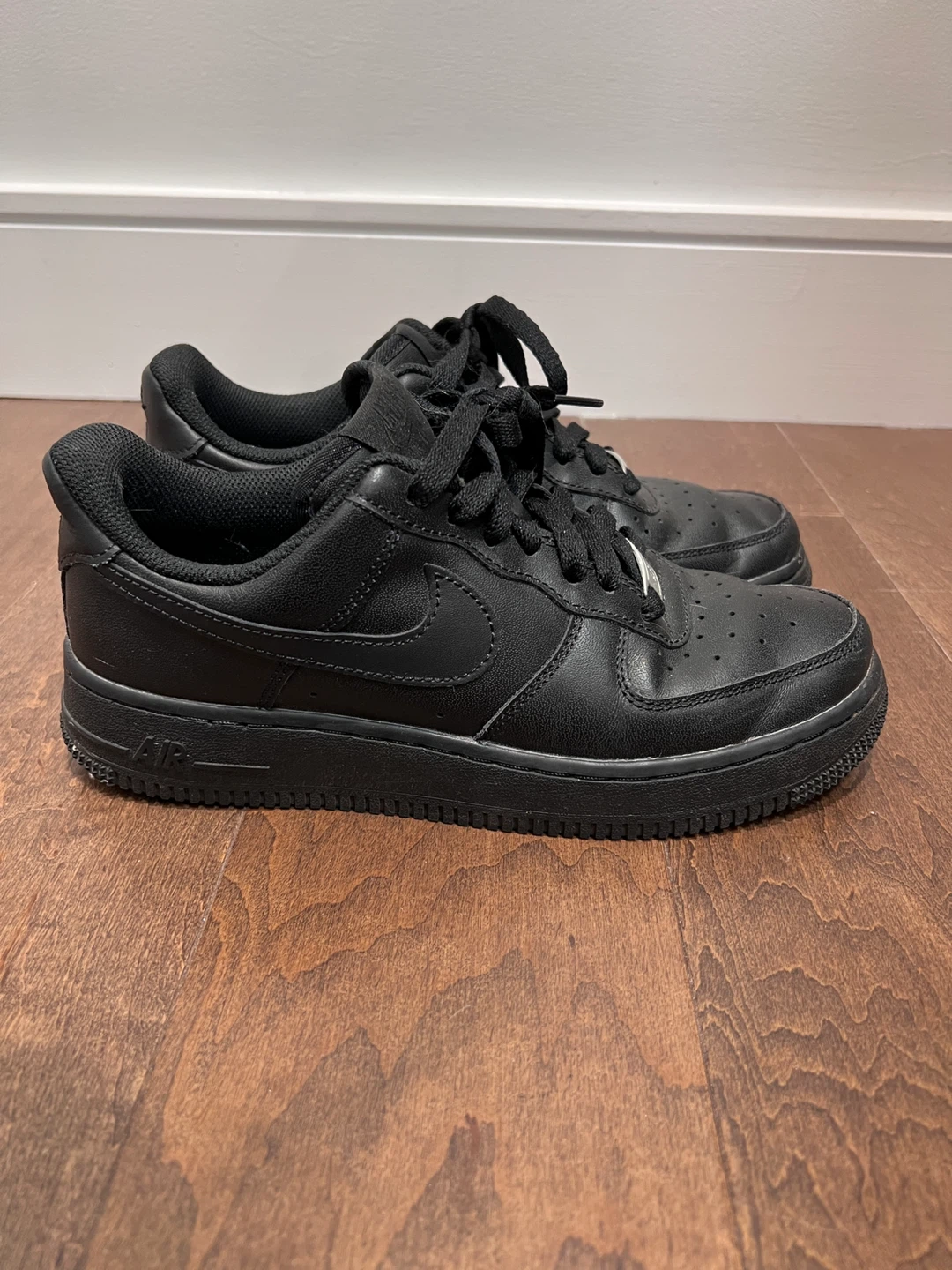 Nike Air Force 1 Black Leather Sneakers- women US7