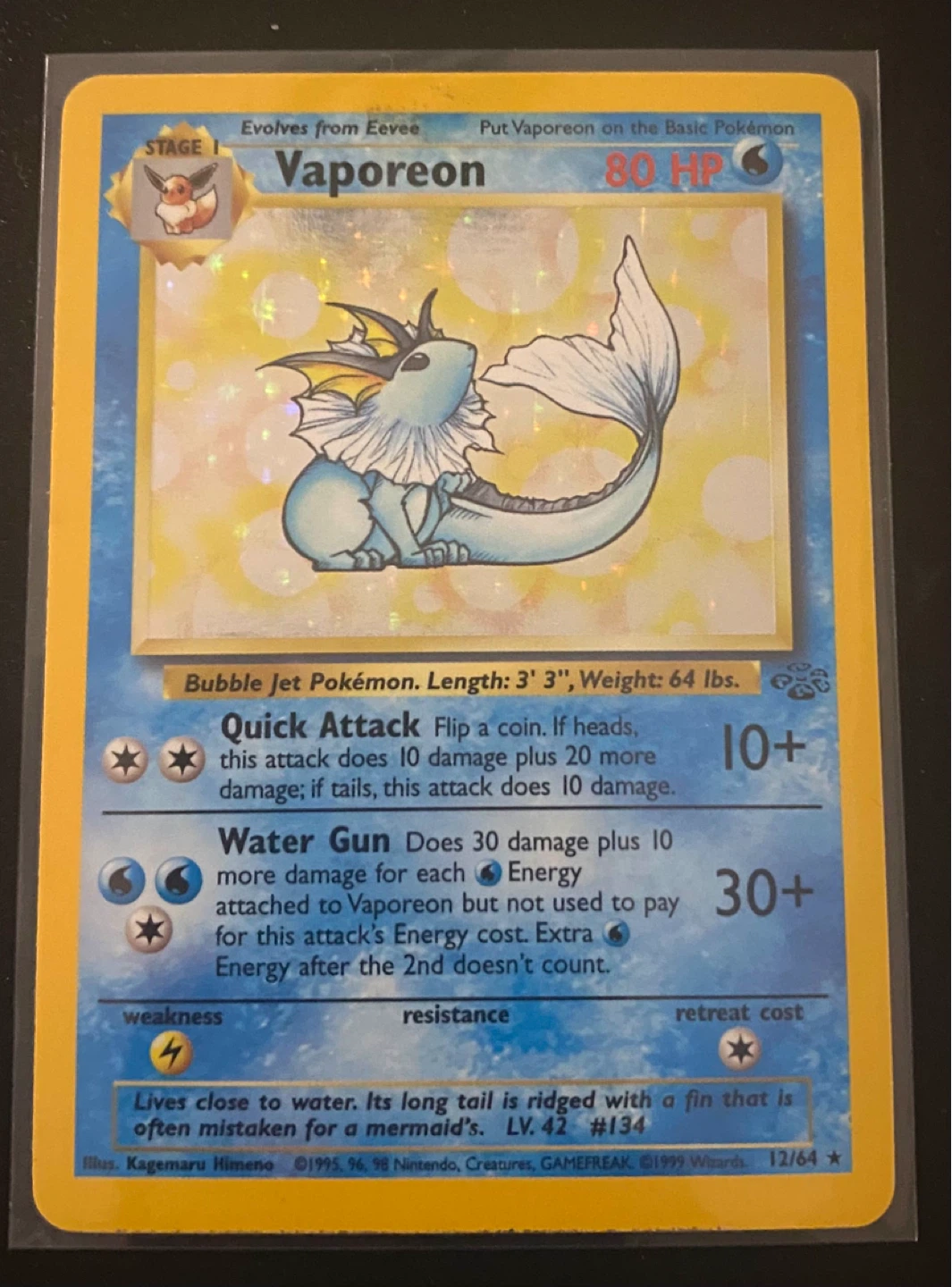Holo rare Vaporeon Pokémon Card (1999) jungle 12/64