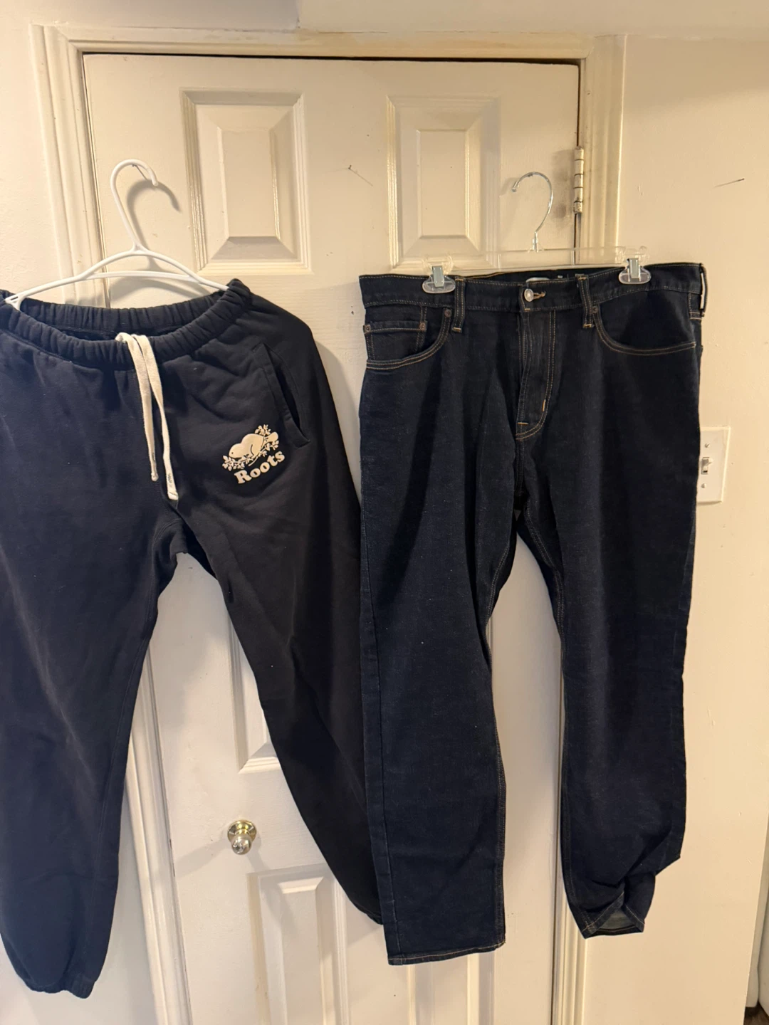 Roots Black Sweatpants and Blue Denim Jeans