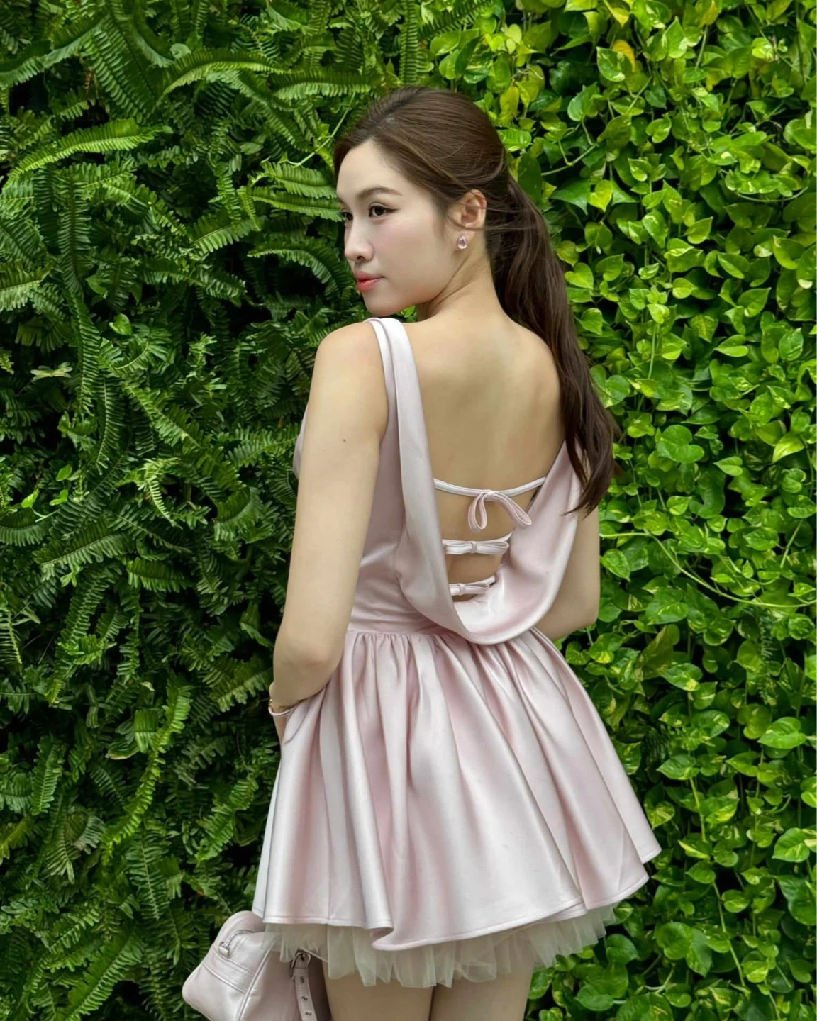 Pink Satin Mini Dress with Ruffle Skirt and Bow Back