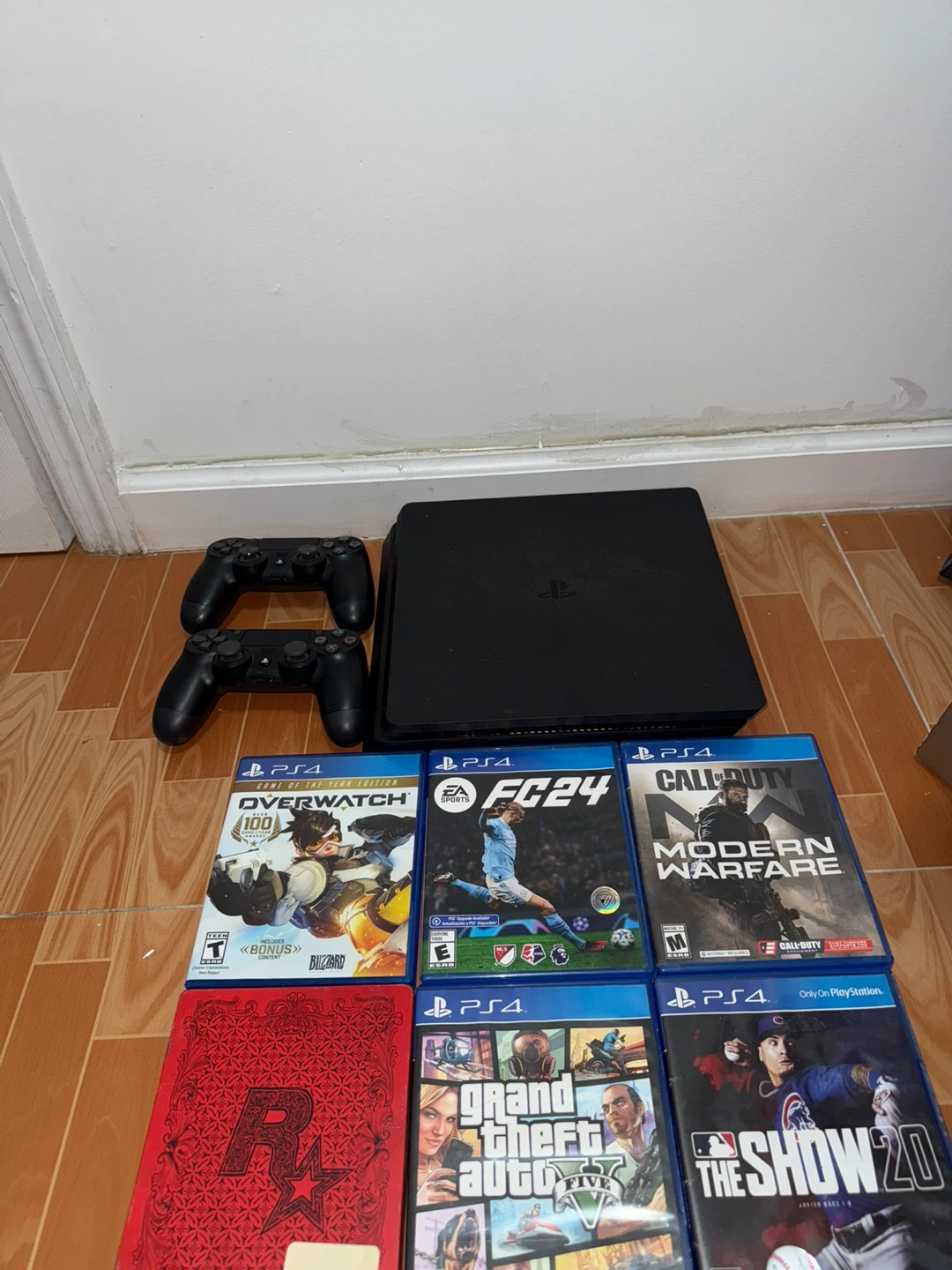 PlayStation 4 Slim Console with 6 Games and 2 Controllers