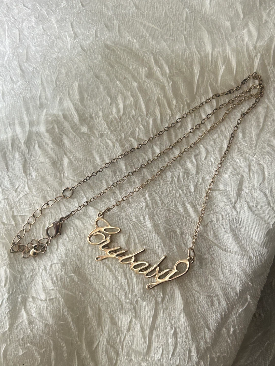 Melanie Martinez gold tone "Crybaby" script necklace