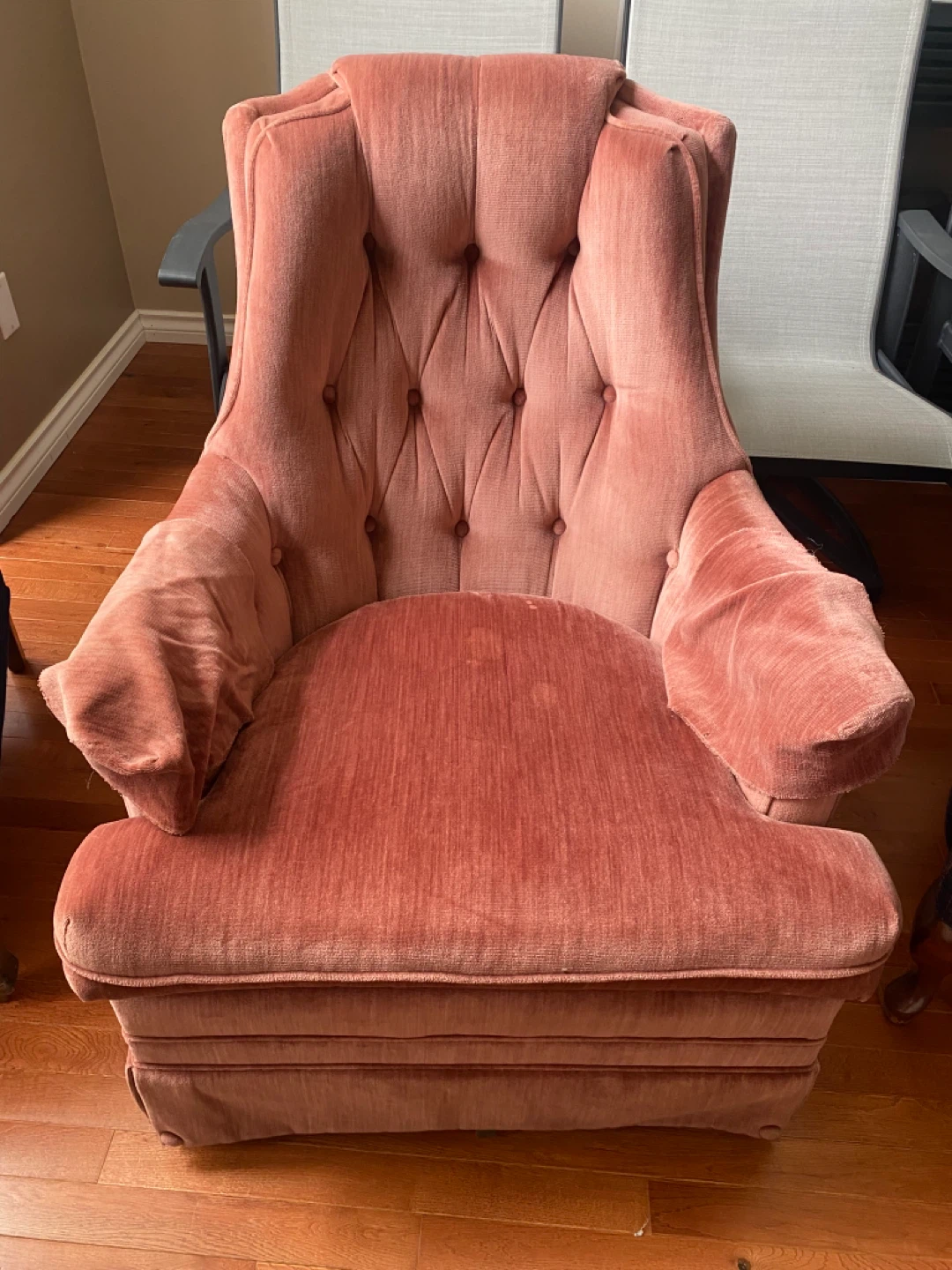 Teal floral wingback chair with ottoman