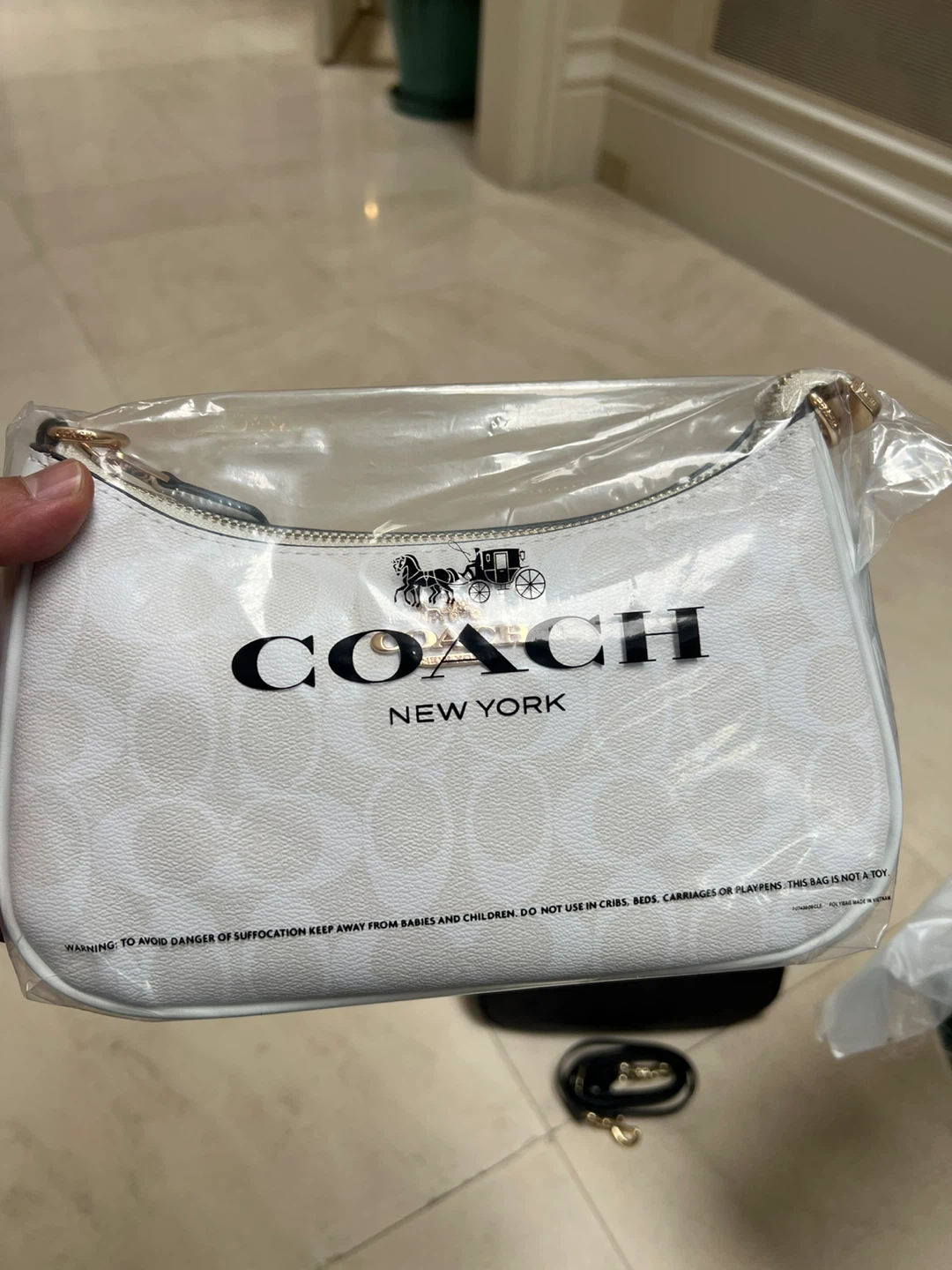 Coach New York White Patterned Wristlet Pouch