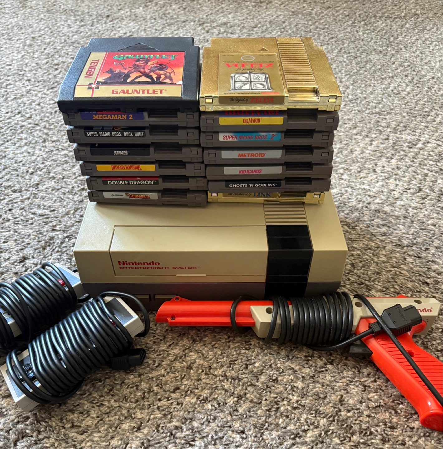 Nintendo NES console, 2 controllers, gun and 15 games