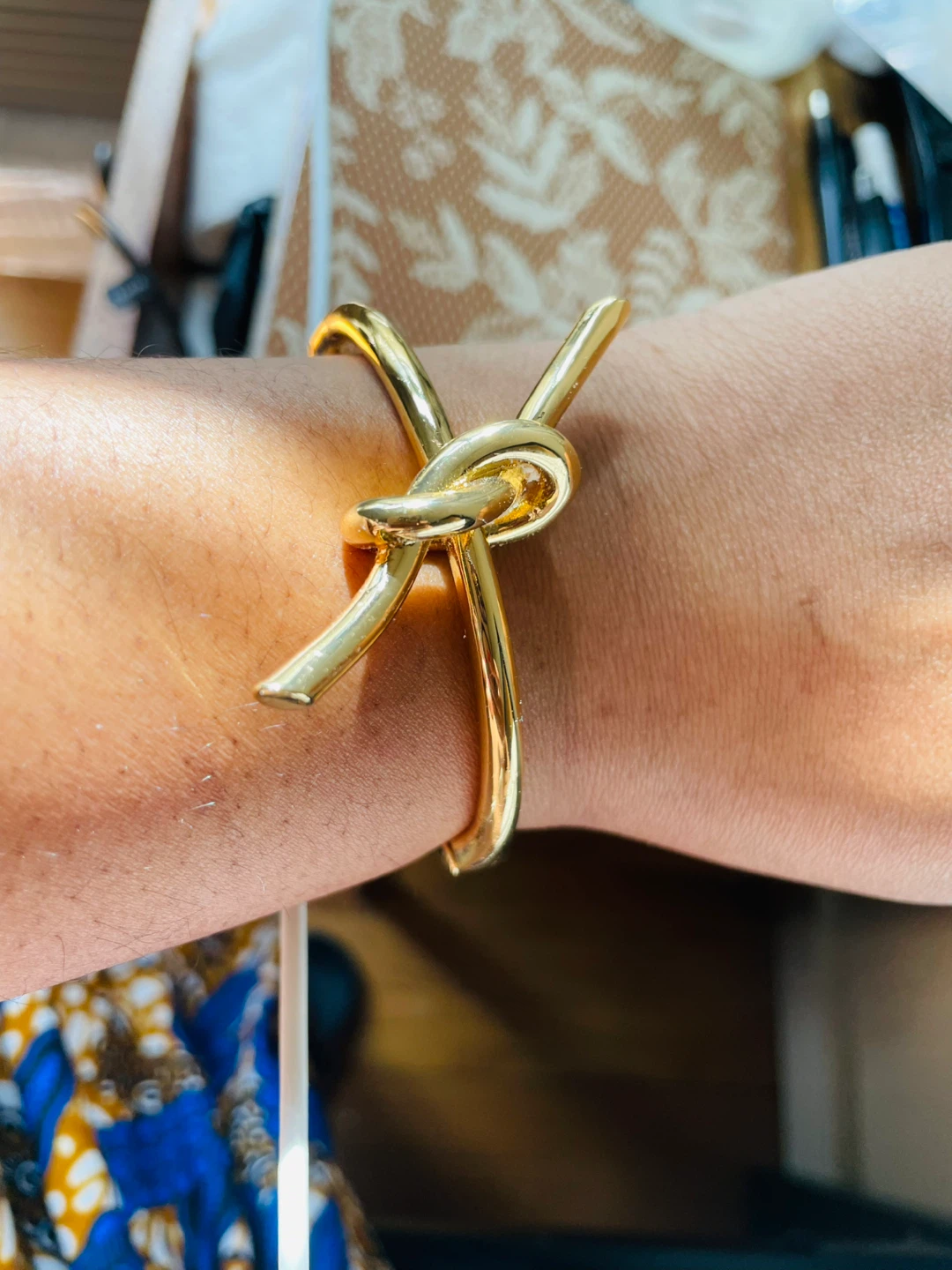 Gold Tone Knot Bangle Bracelet