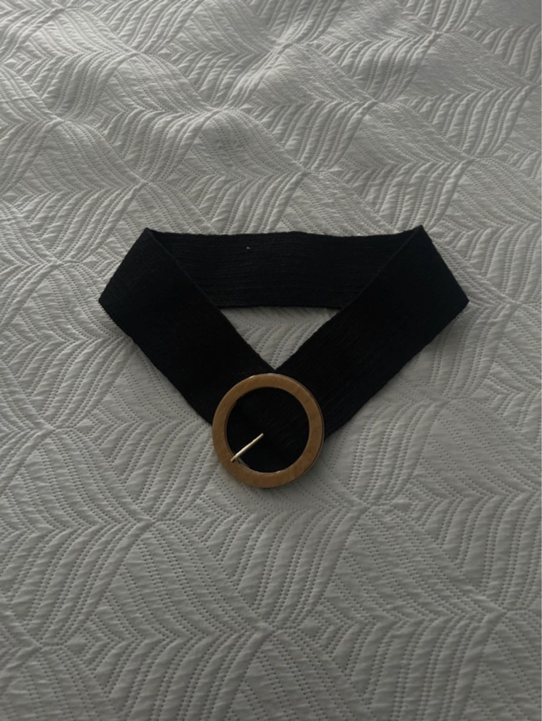 Black fabric belt with wooden buckle