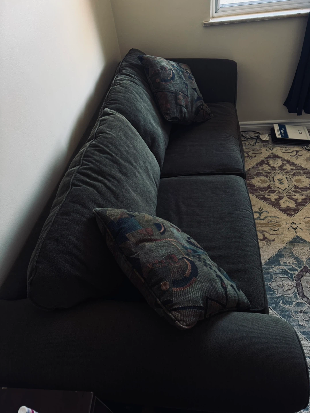 Dark Green Sofa with Throw Pillows