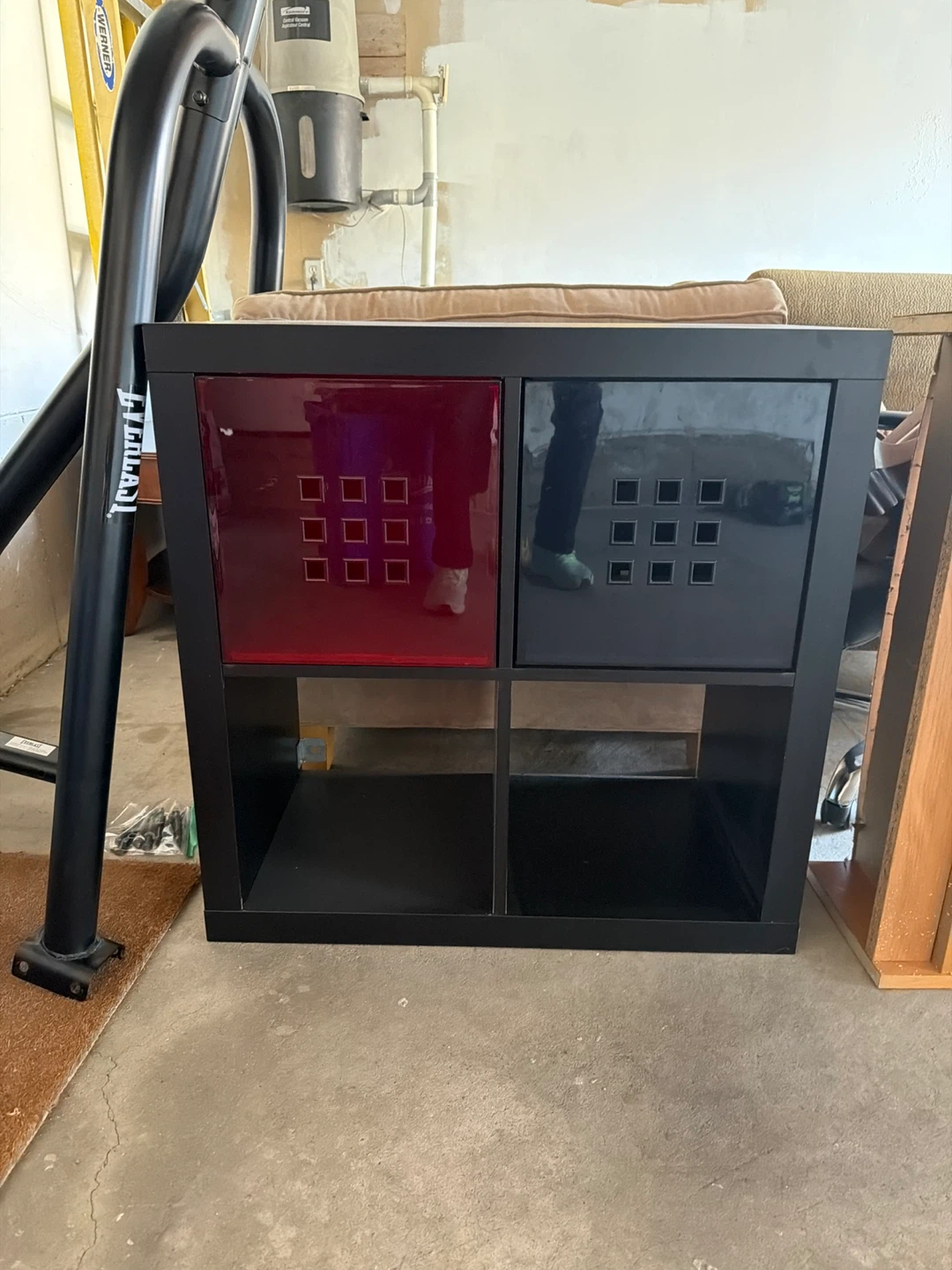 Black Cube Storage Unit with Red and Grey Inserts