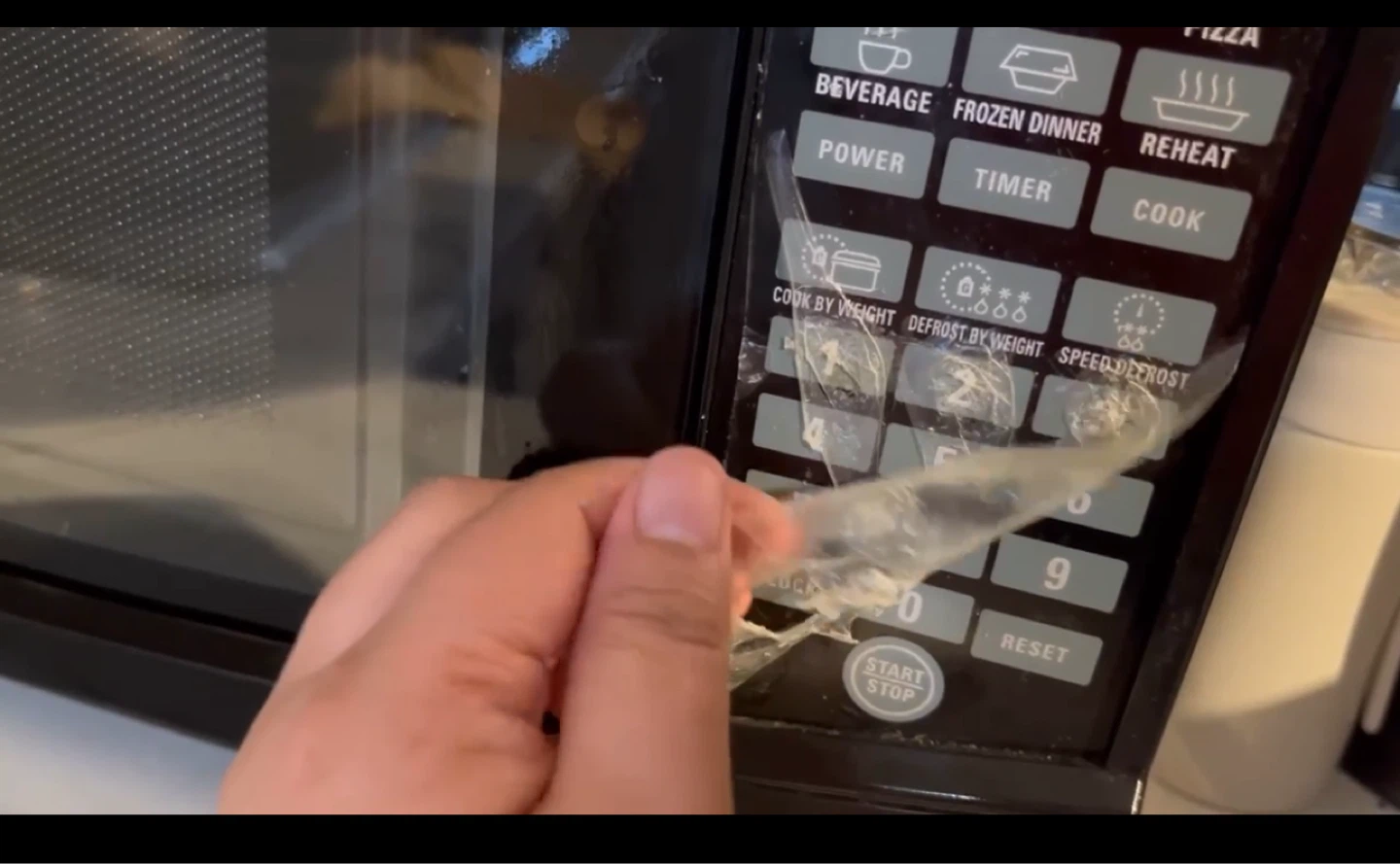 RCA Microwave Oven (has still plastic on its buttons)