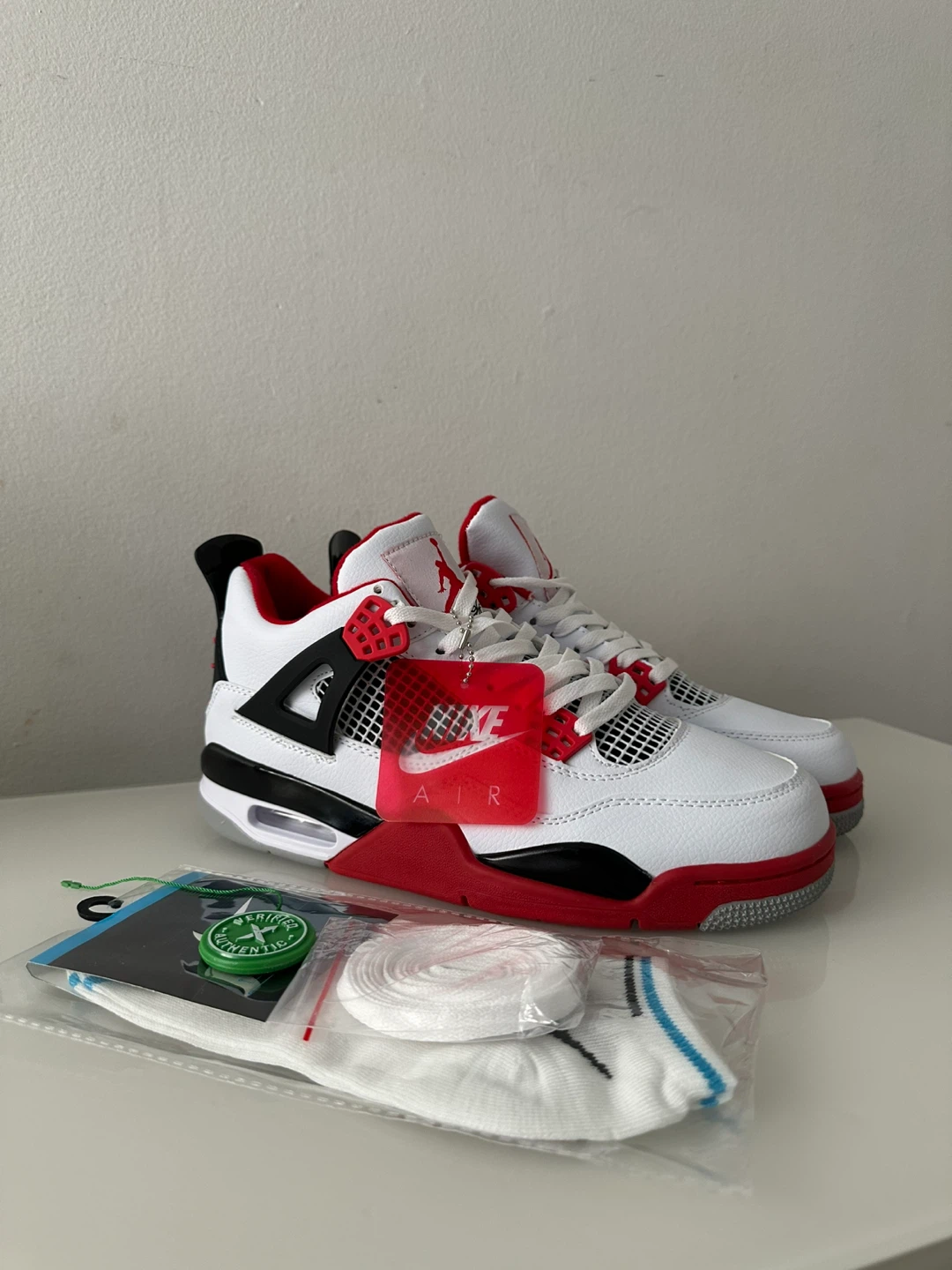 Air Jordan 4 "White & Red" Sneakers