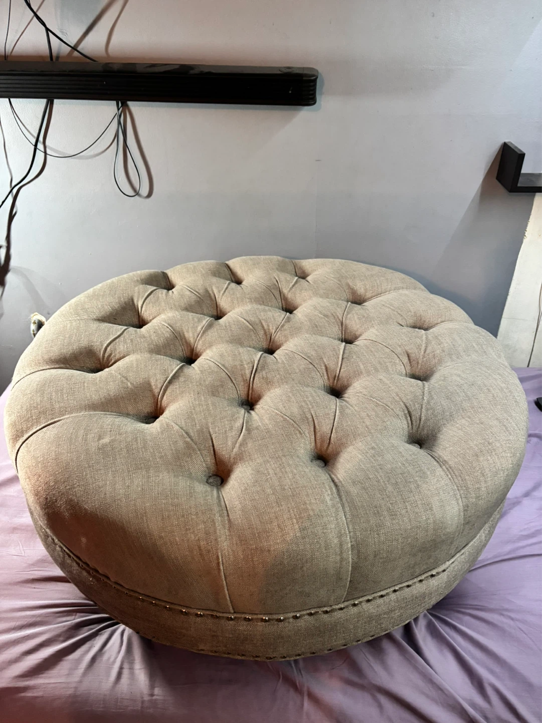 Tufted Round Ottoman with Studded Trim