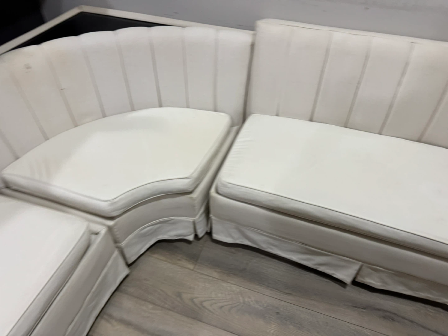 White Curved Sectional Sofa with Ottoman