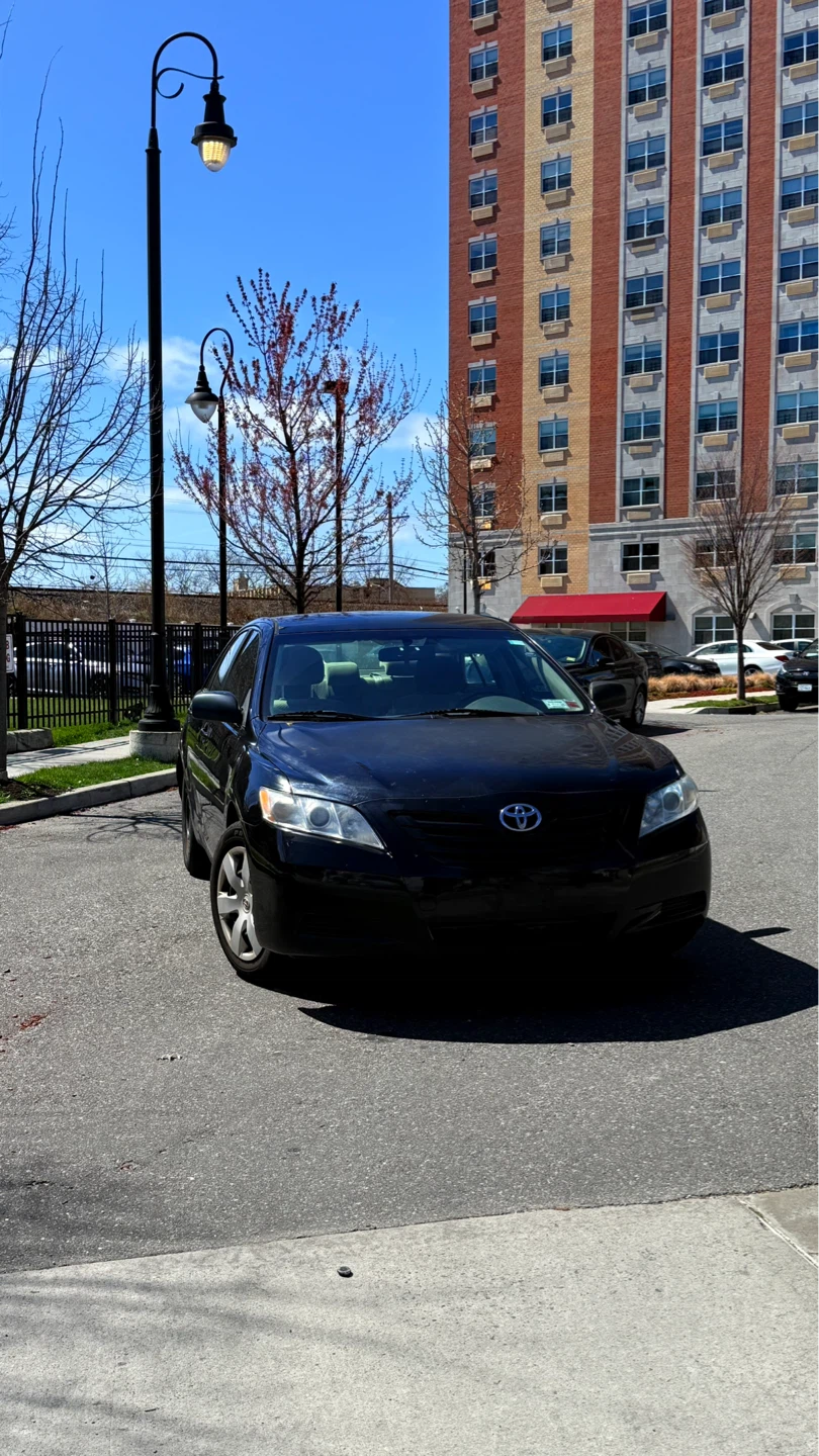 Black Toyota Camry Sedan