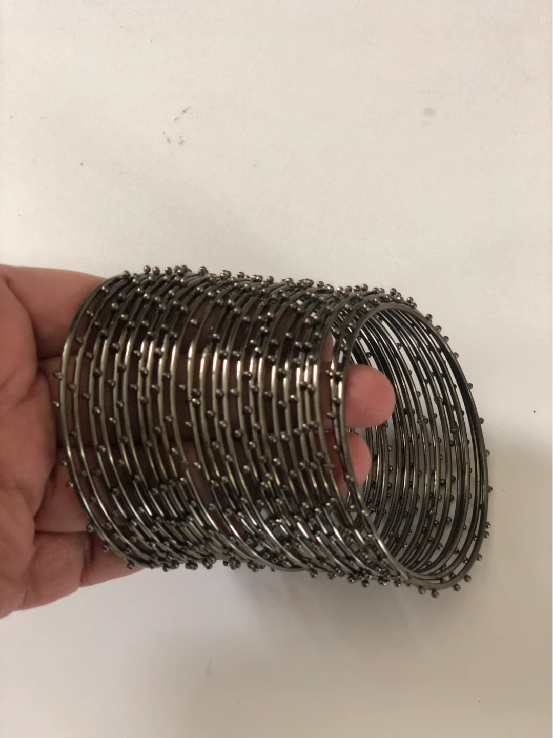 Set of 12 Metal Bangles black in tone