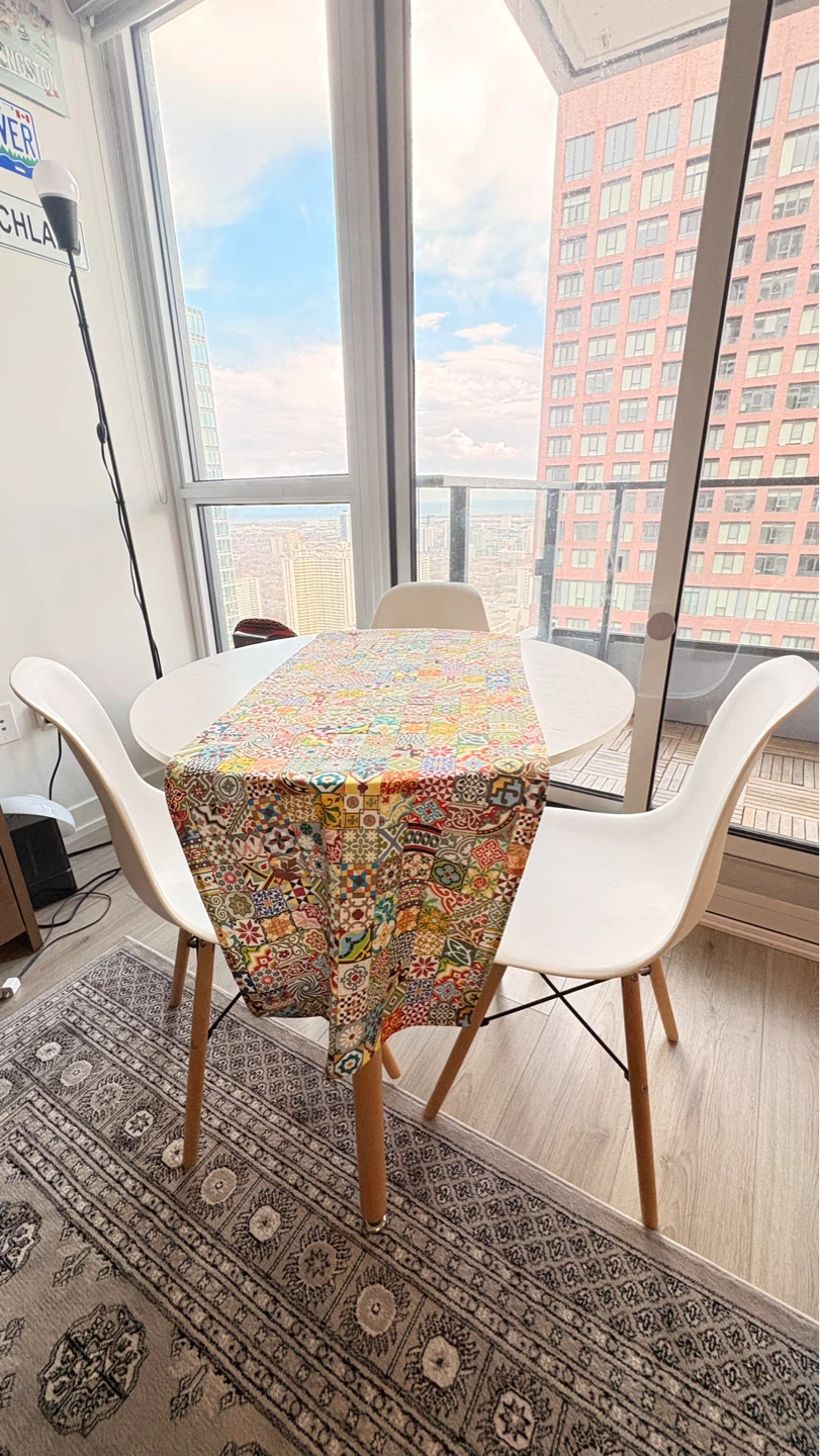 White Round Dining Table with 3 White Chairs