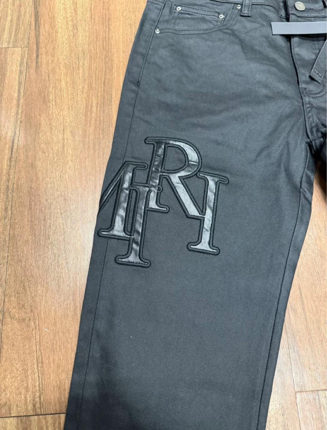 Amiri Staggered Logo Waxed Skinny Jeans - Black - photo 2