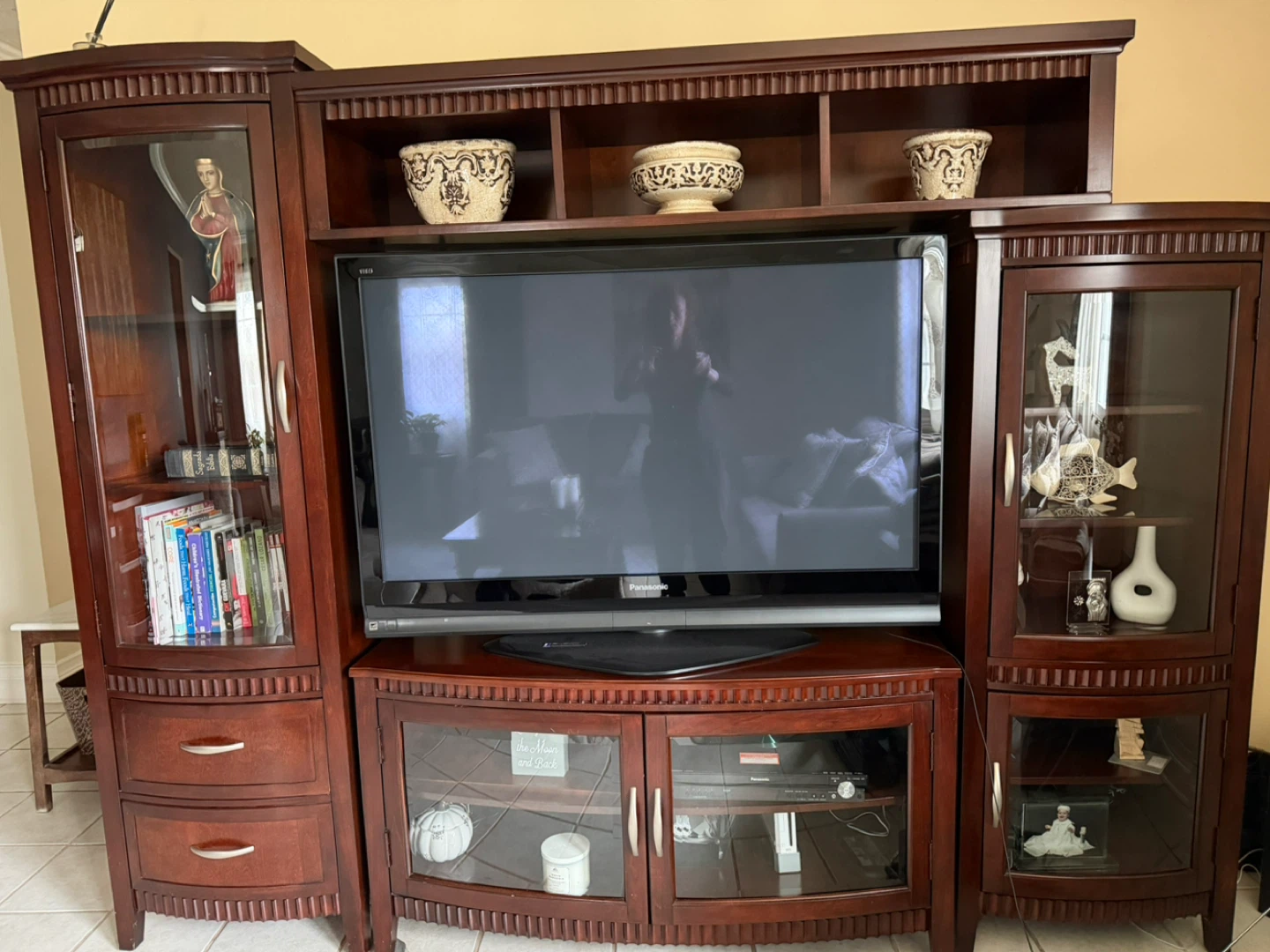 Wooden Entertainment Center with Glass Doors and Shelving