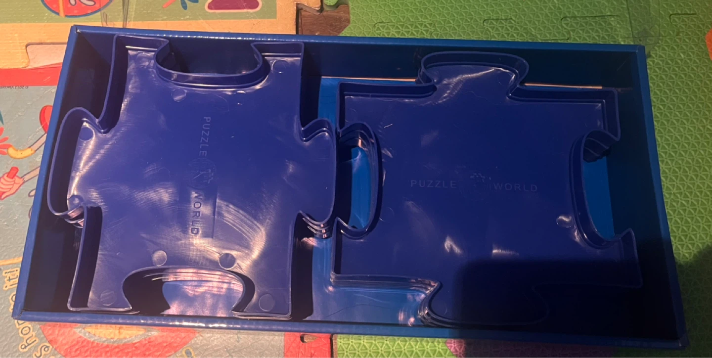 Contenant bleu Puzzle World