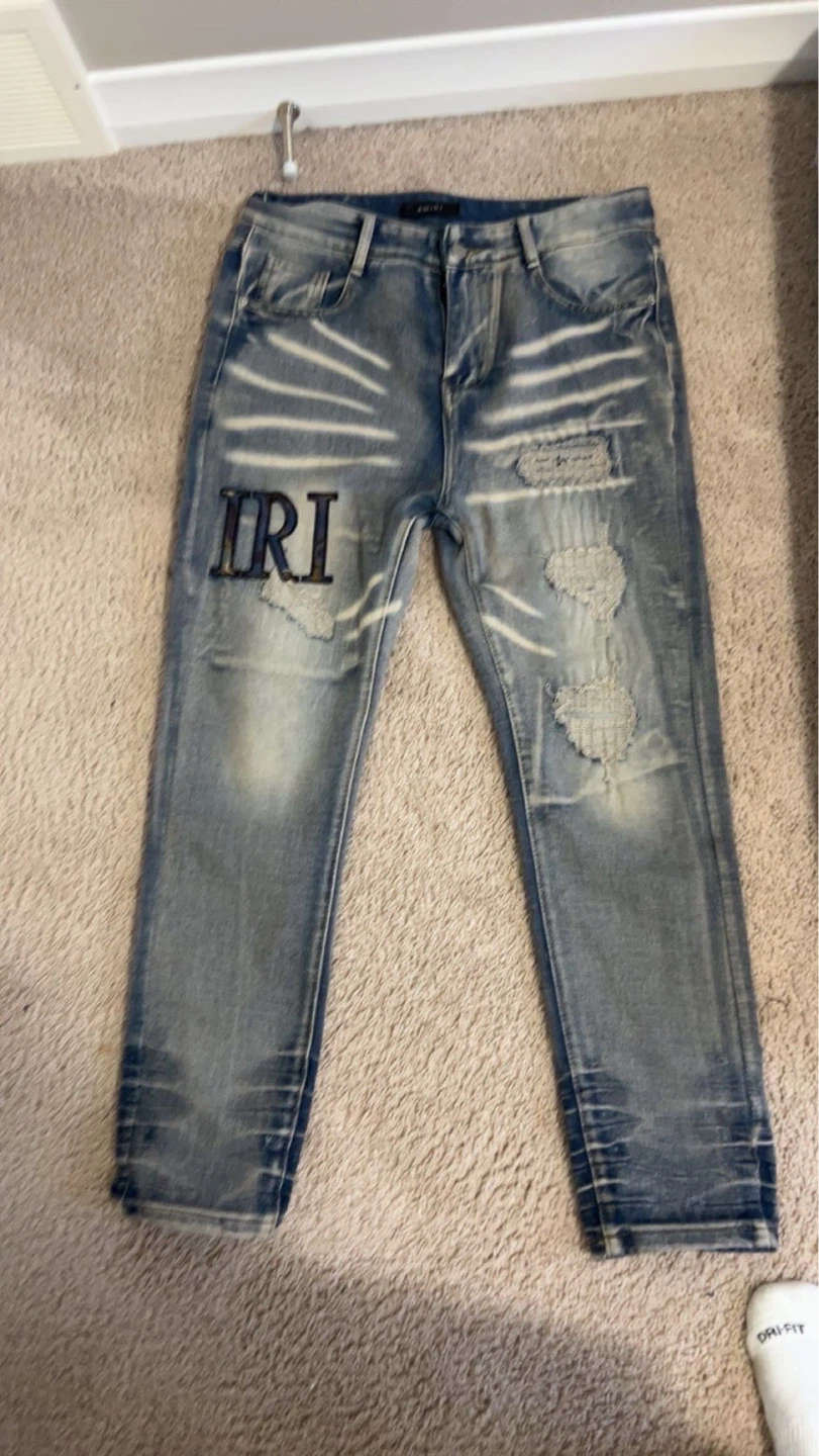 AMIRI Distressed Jeans