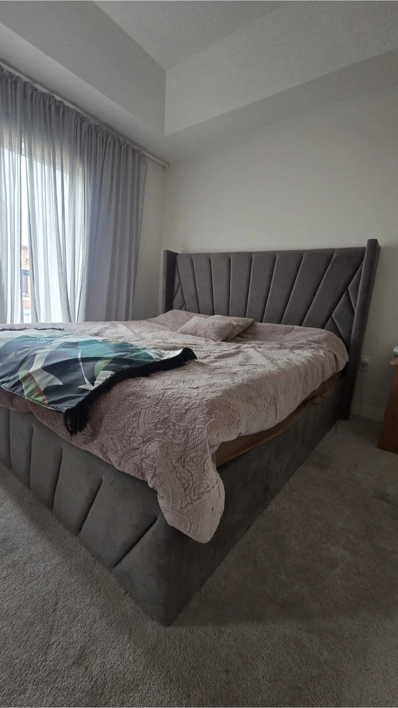Grey Tufted Headboard and high mattress