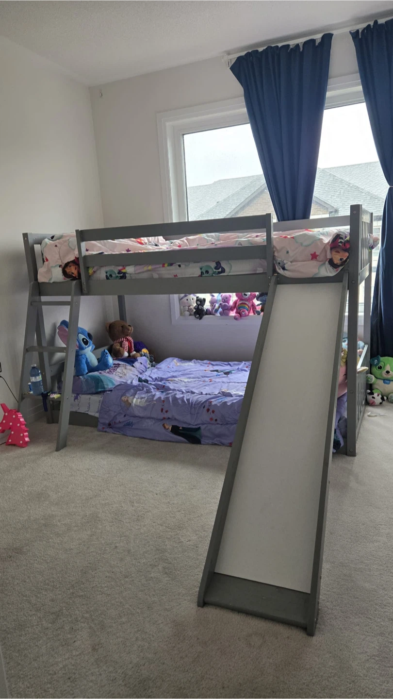 Grey wooden bunk bed with slide