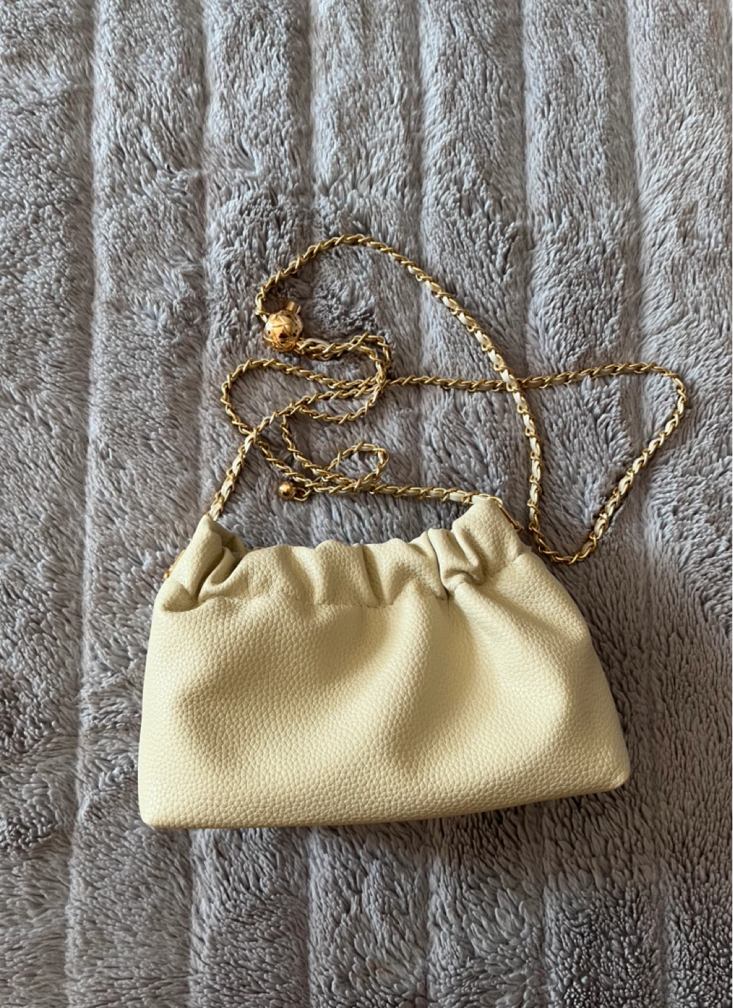 Cream Faux Leather Drawstring Clutch with Gold Chain Strap