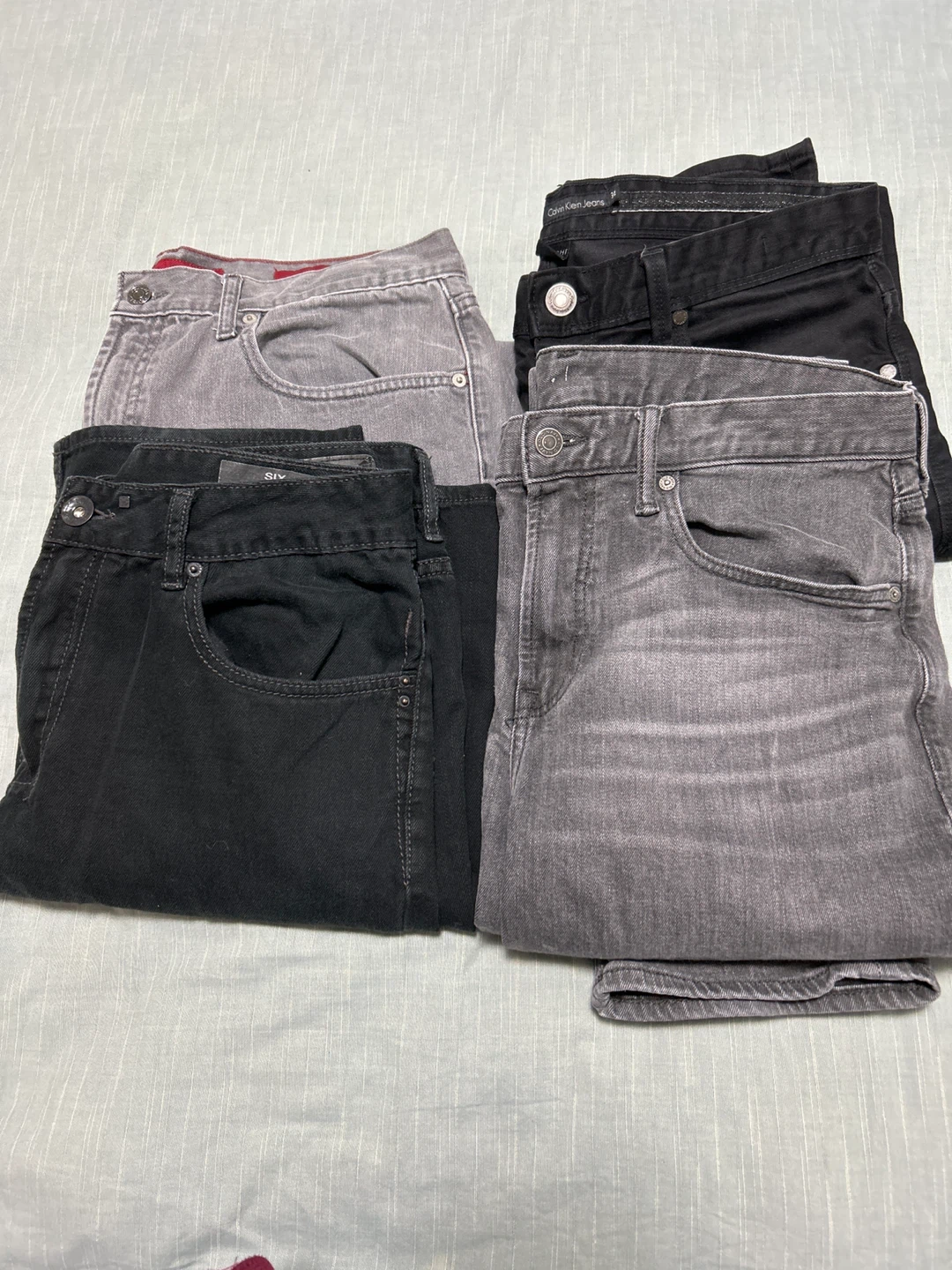4 Pairs of Men's Jeans
